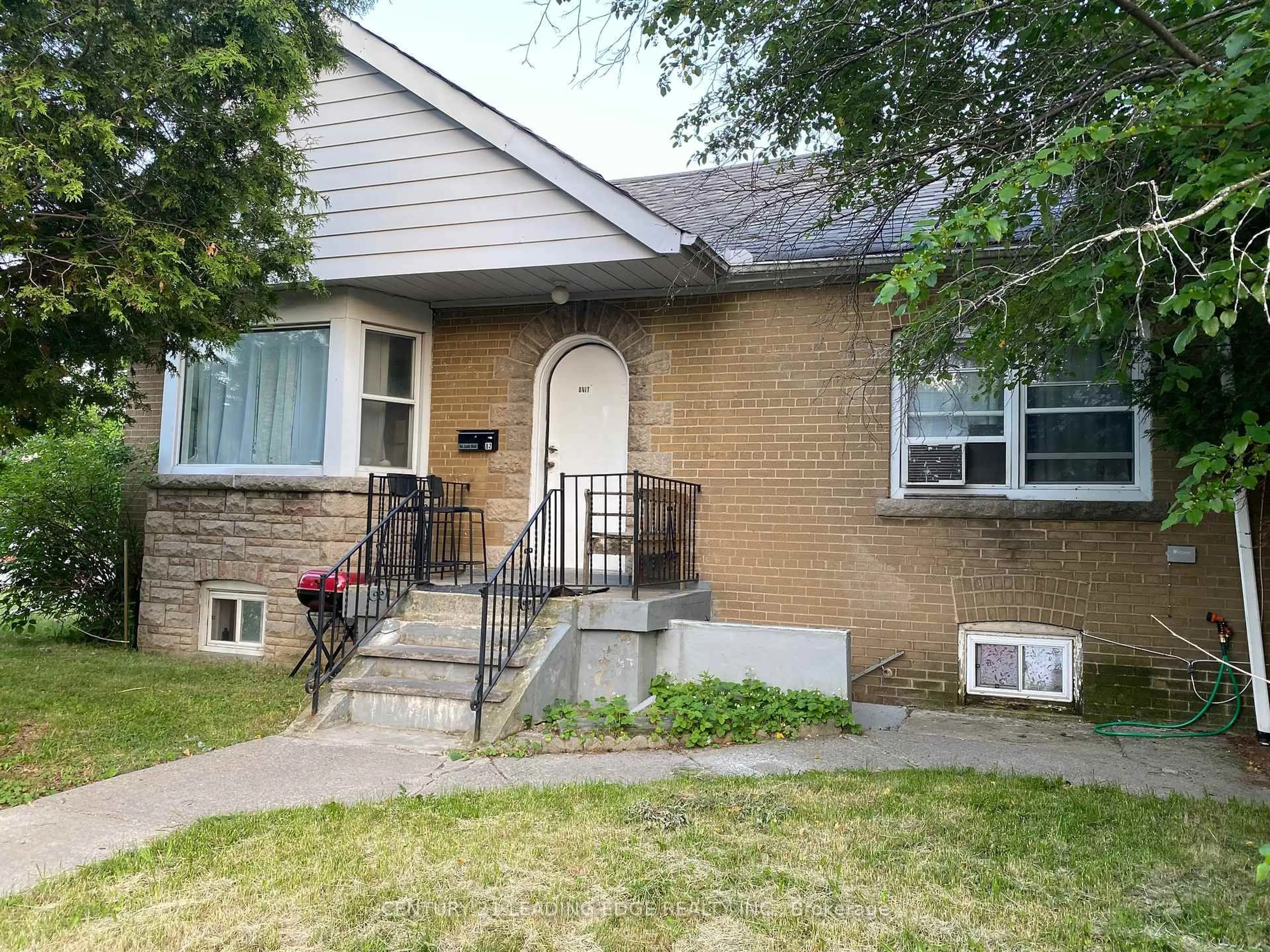 Home with brick exterior material, street for 82 Meighen Ave, Toronto Ontario M4B 2H5