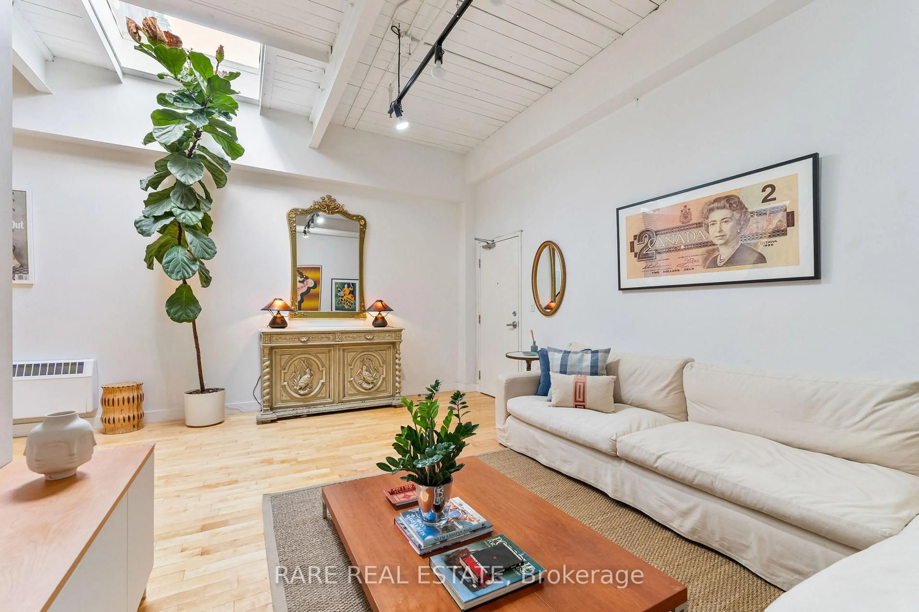Living room with furniture, unknown for 326 Carlaw Ave #233, Toronto Ontario M4M 3N8