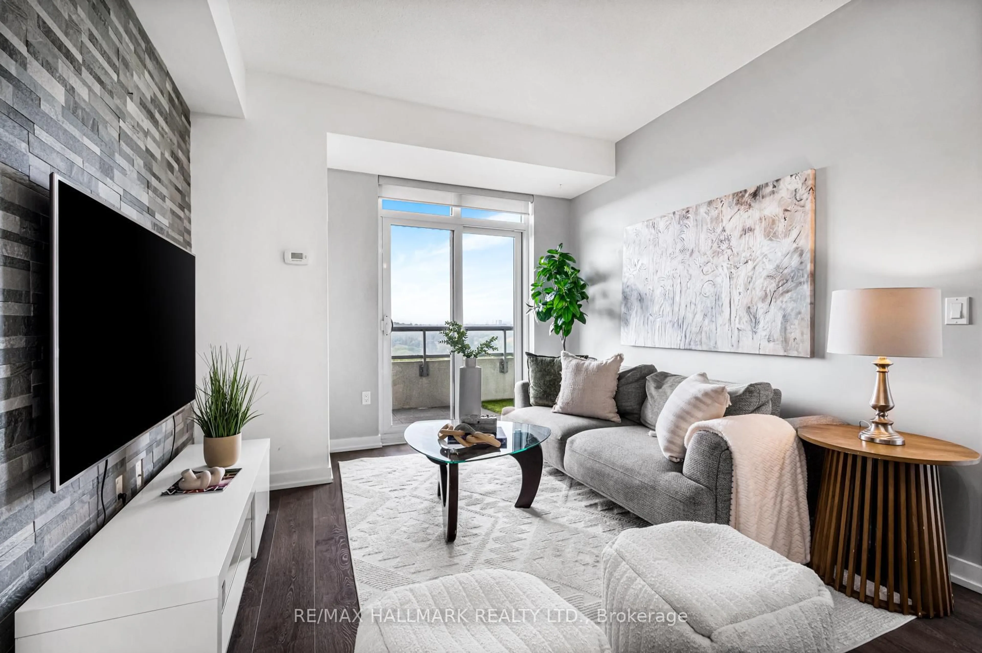 Living room with furniture, unknown for 1346 Danforth Rd #1006, Toronto Ontario M1J 0A9