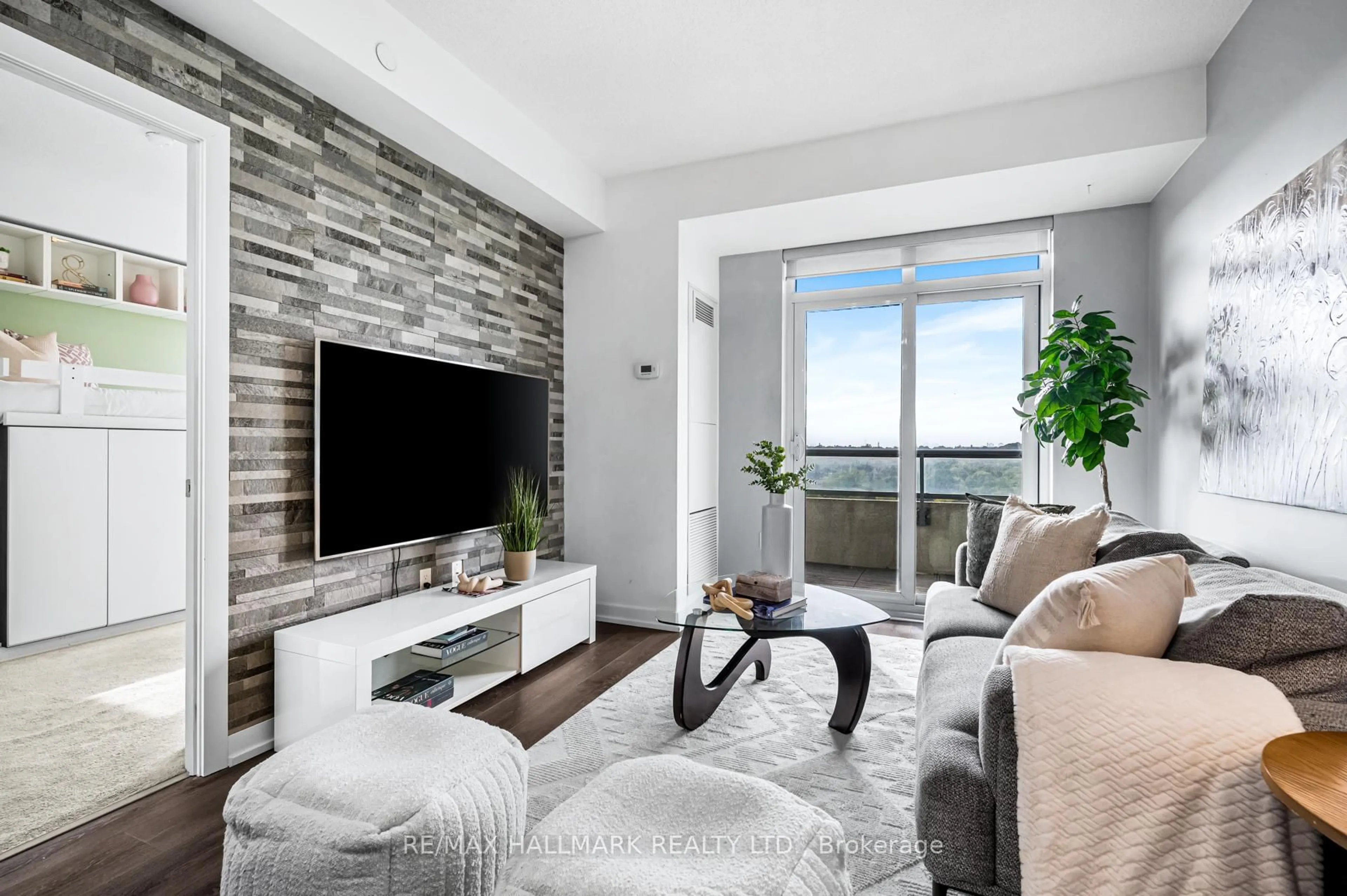 Living room with furniture, unknown for 1346 Danforth Rd #1006, Toronto Ontario M1J 0A9