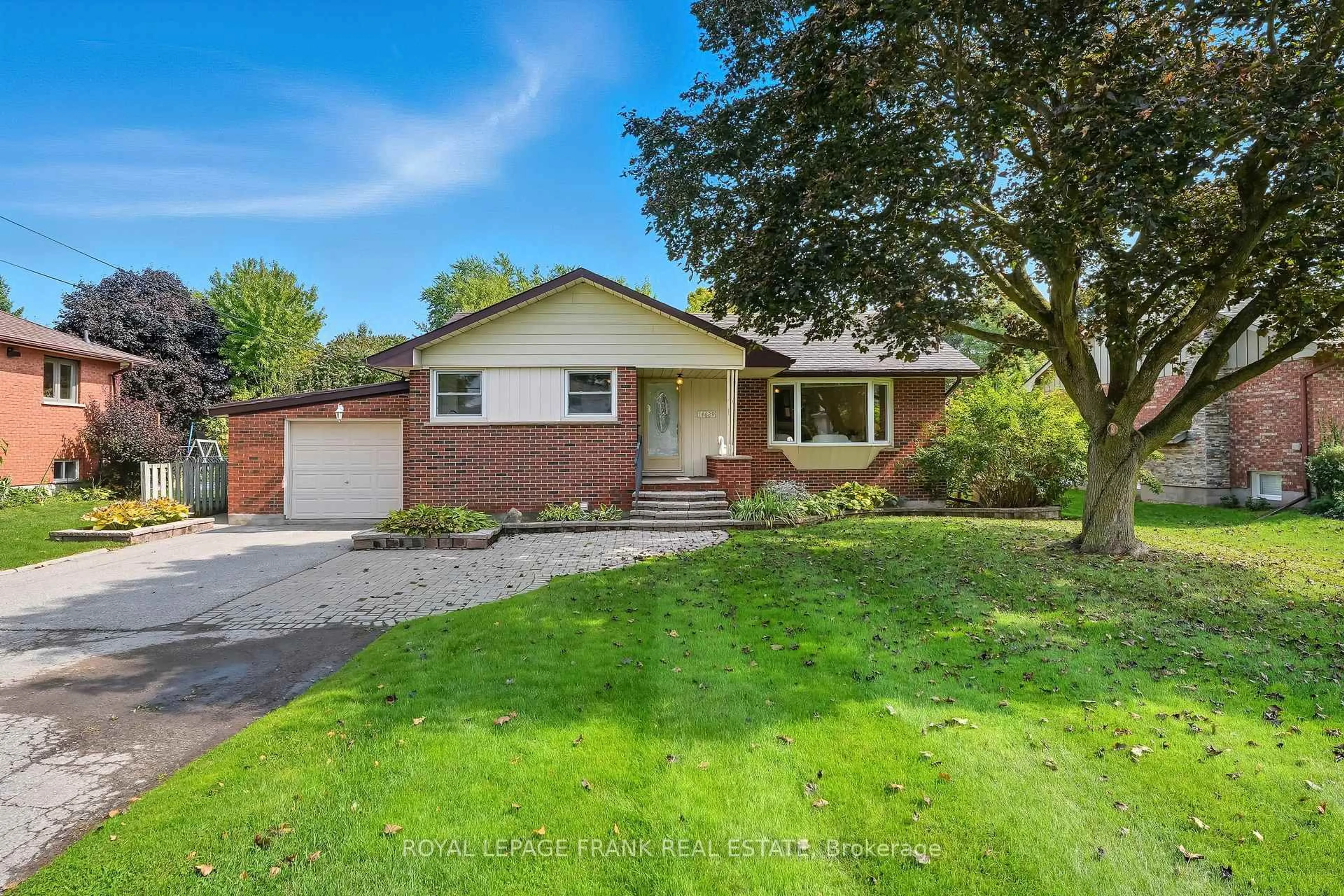 Home with brick exterior material, street for 14629 Old Simcoe Rd, Scugog Ontario L9L 1C1