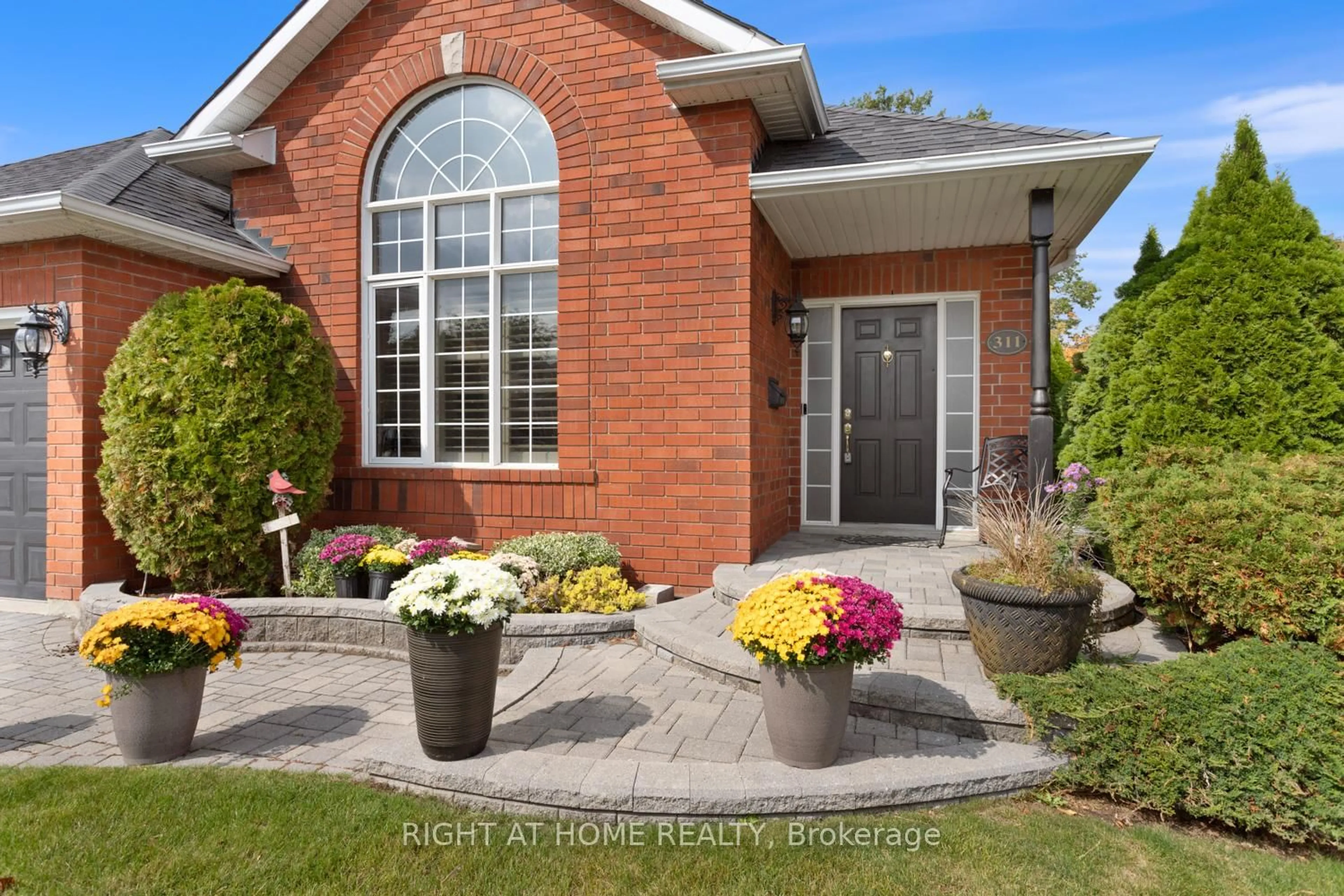 Home with brick exterior material, street for 311 Waterbury Cres, Scugog Ontario L9L 1S5