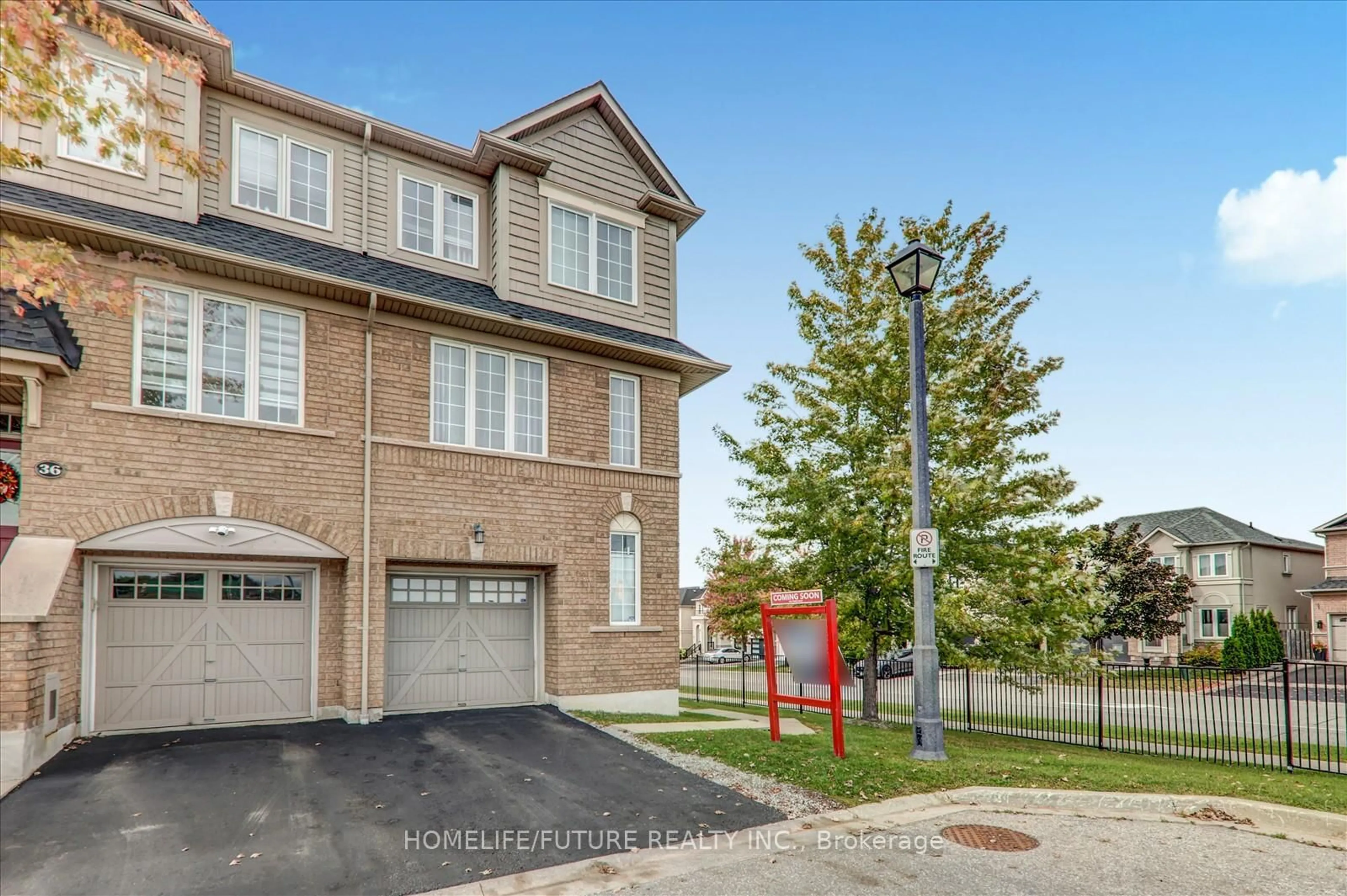 Home with brick exterior material, street for 38 Lavan Lane, Ajax Ontario L1T 0H1