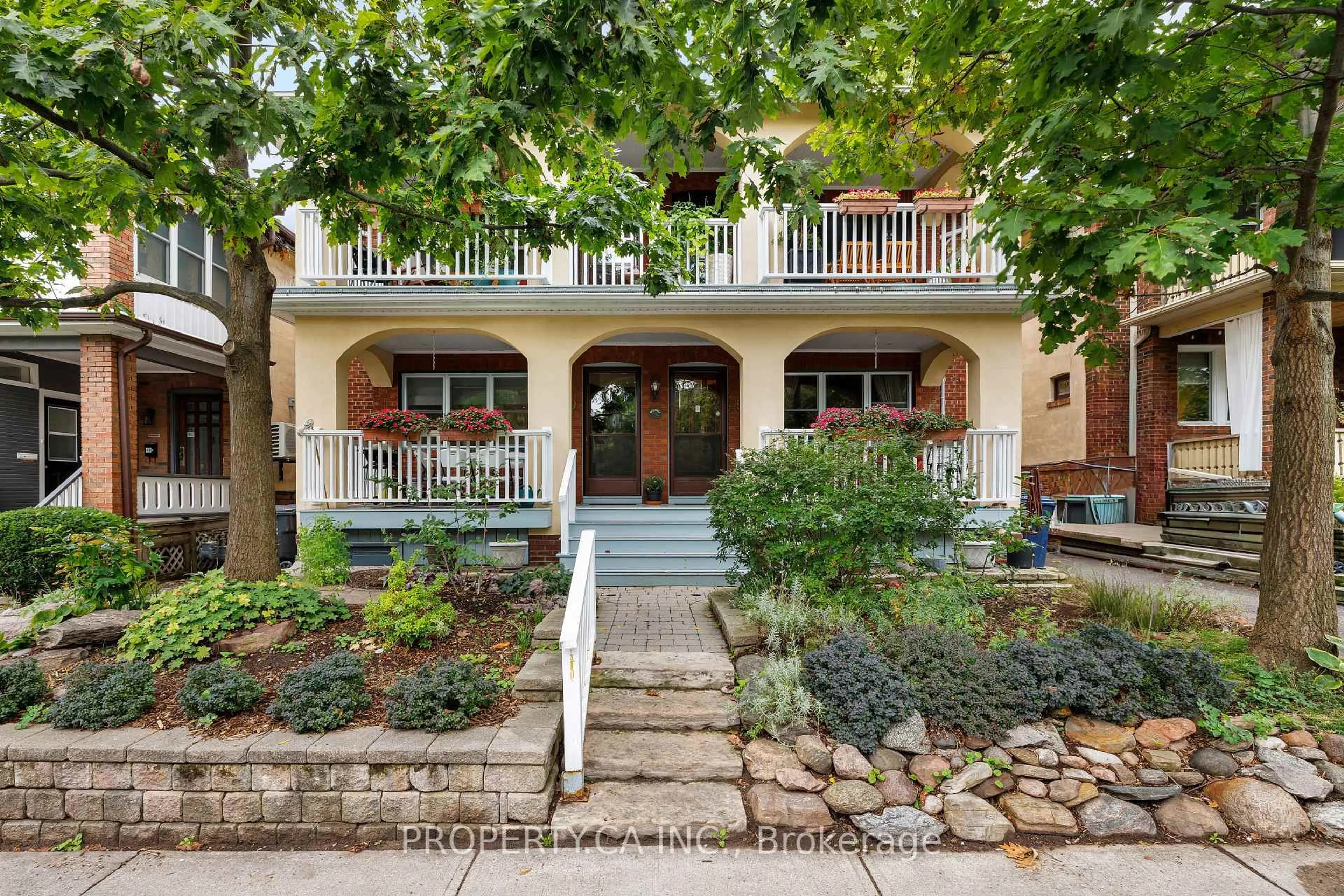 Home with brick exterior material, street for 52 Wineva Ave #Upper, Toronto Ontario M4E 2T2