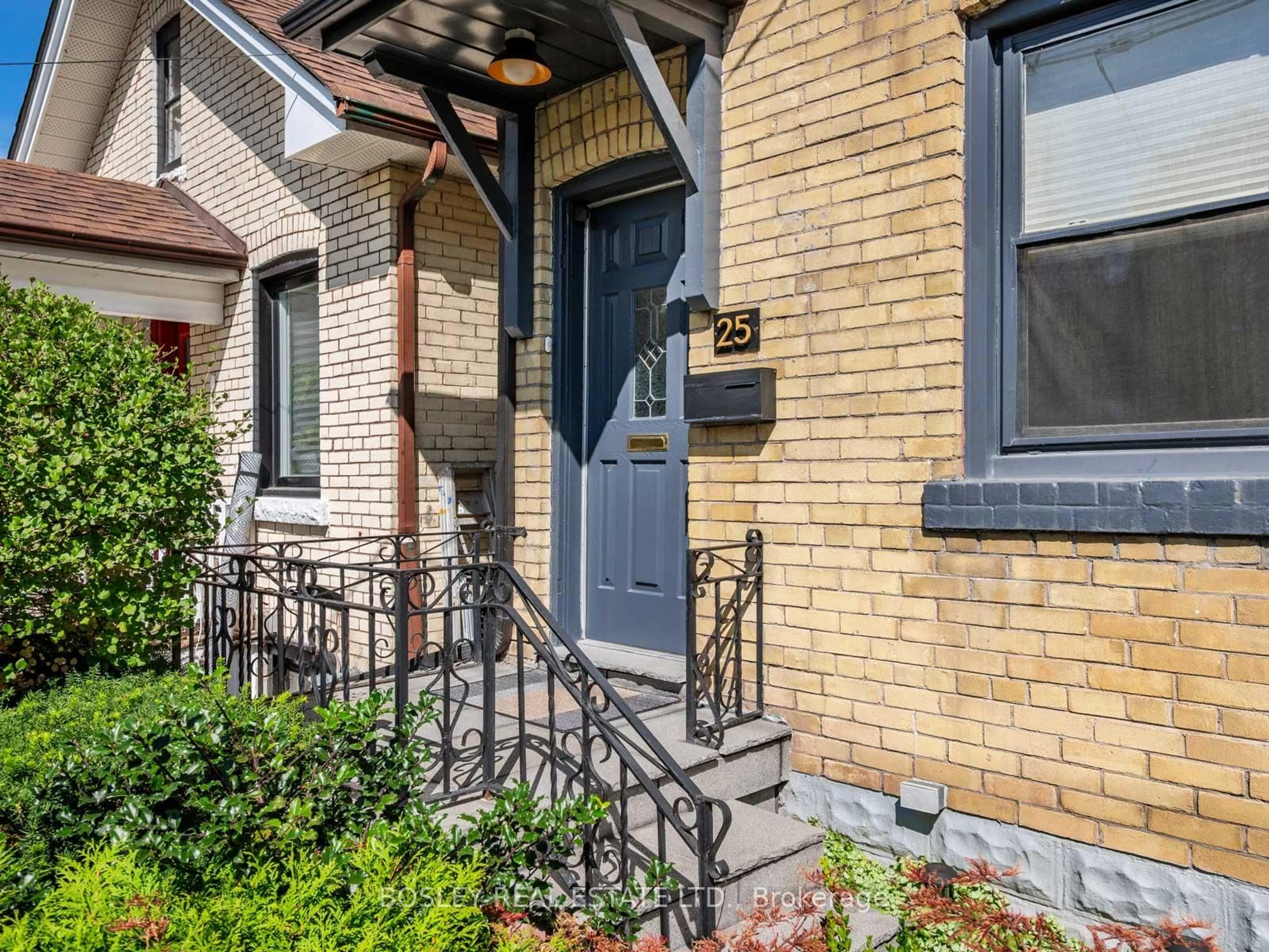 Home with brick exterior material, street for 25 Newman Ave, Toronto Ontario M4C 5A5