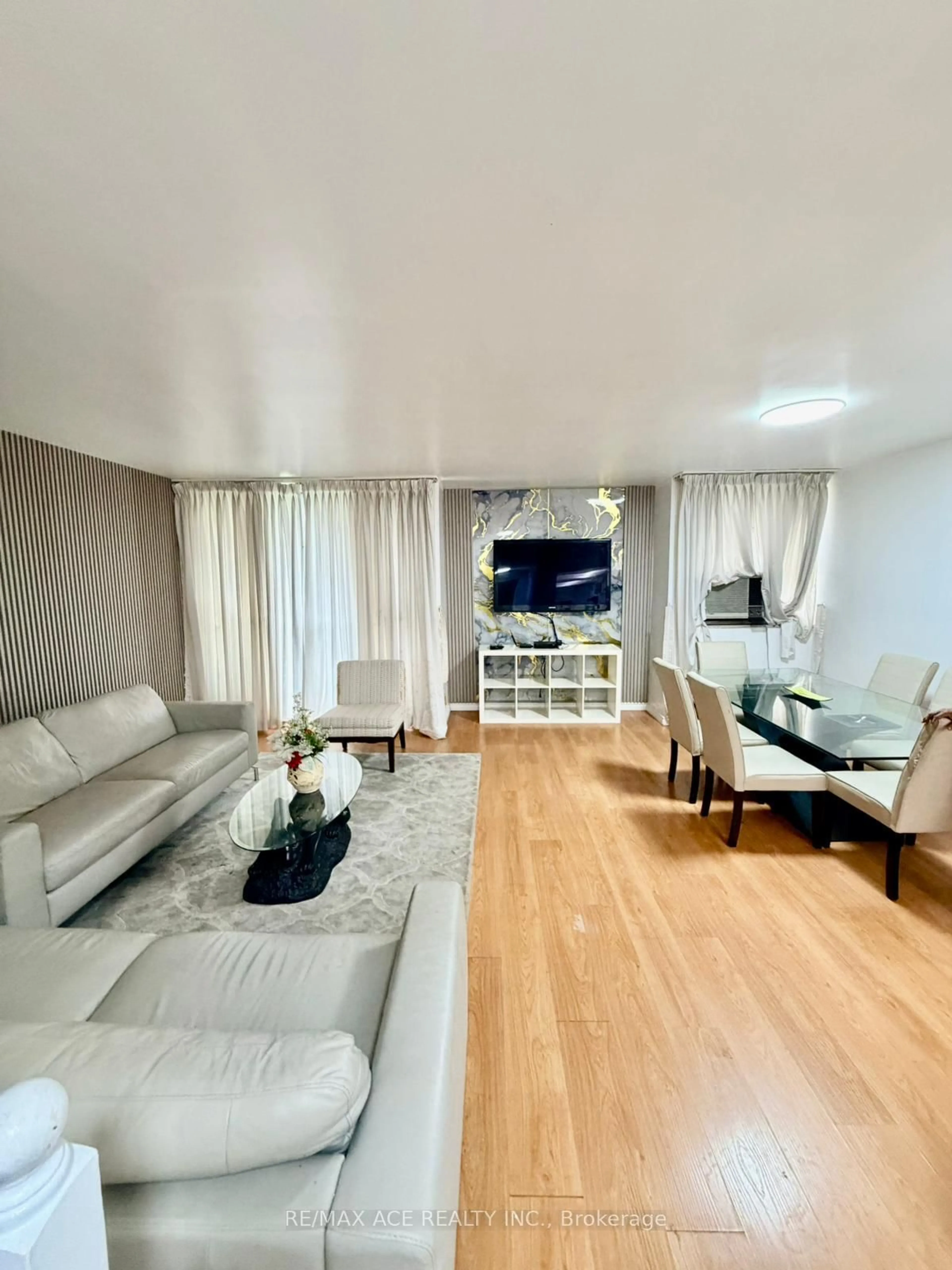 Living room with furniture, unknown for 10 Crescent Town Rd #303, Toronto Ontario M4C 5L3