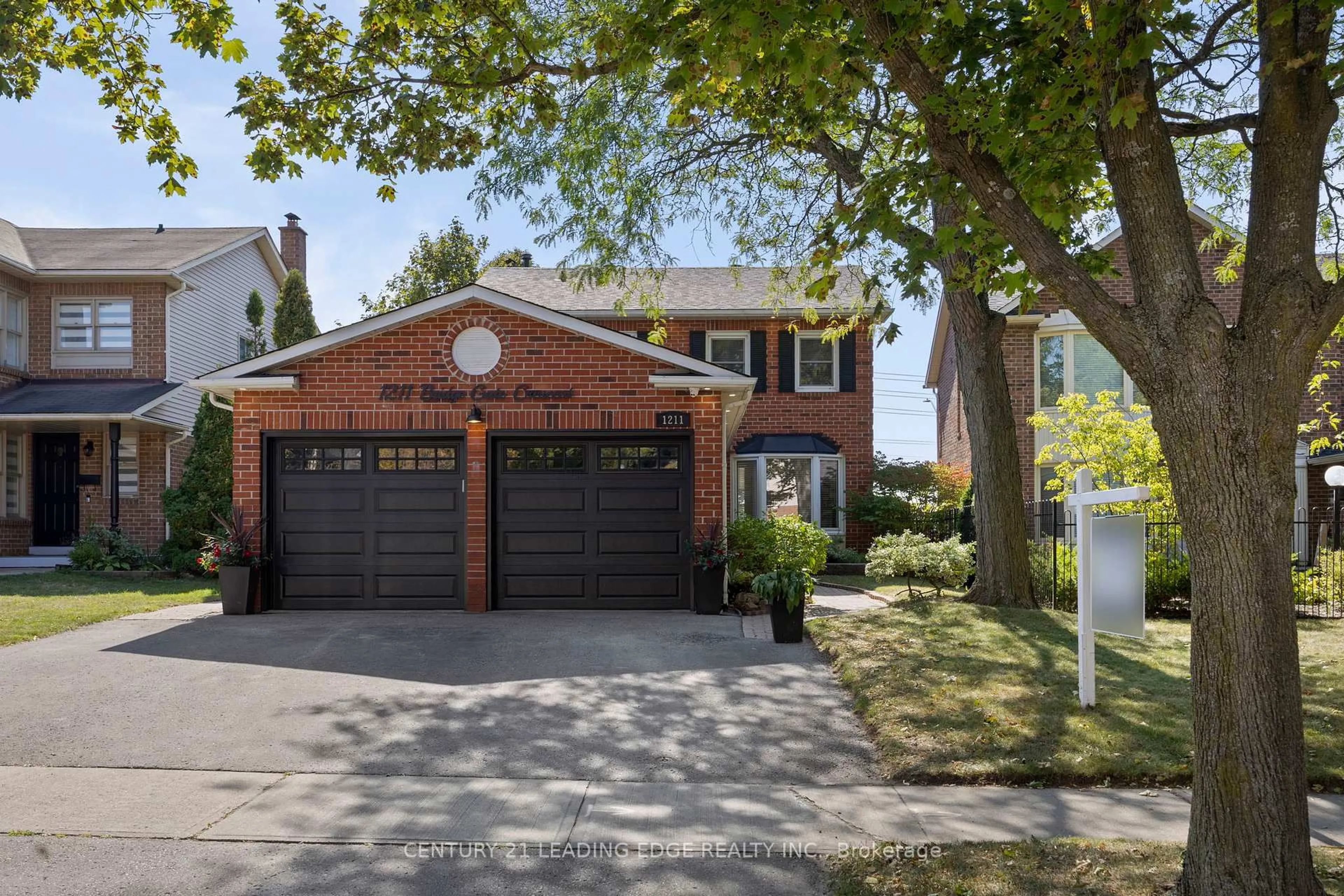 Home with brick exterior material, street for 1211 Bridge Gate Cres, Pickering Ontario L1X 1A3