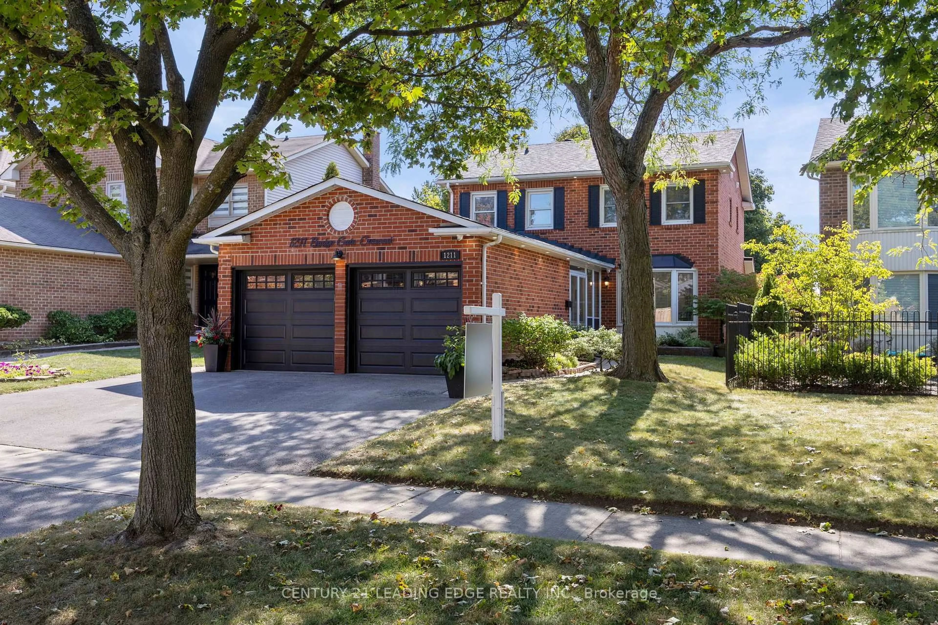 Home with brick exterior material, street for 1211 Bridge Gate Cres, Pickering Ontario L1X 1A3