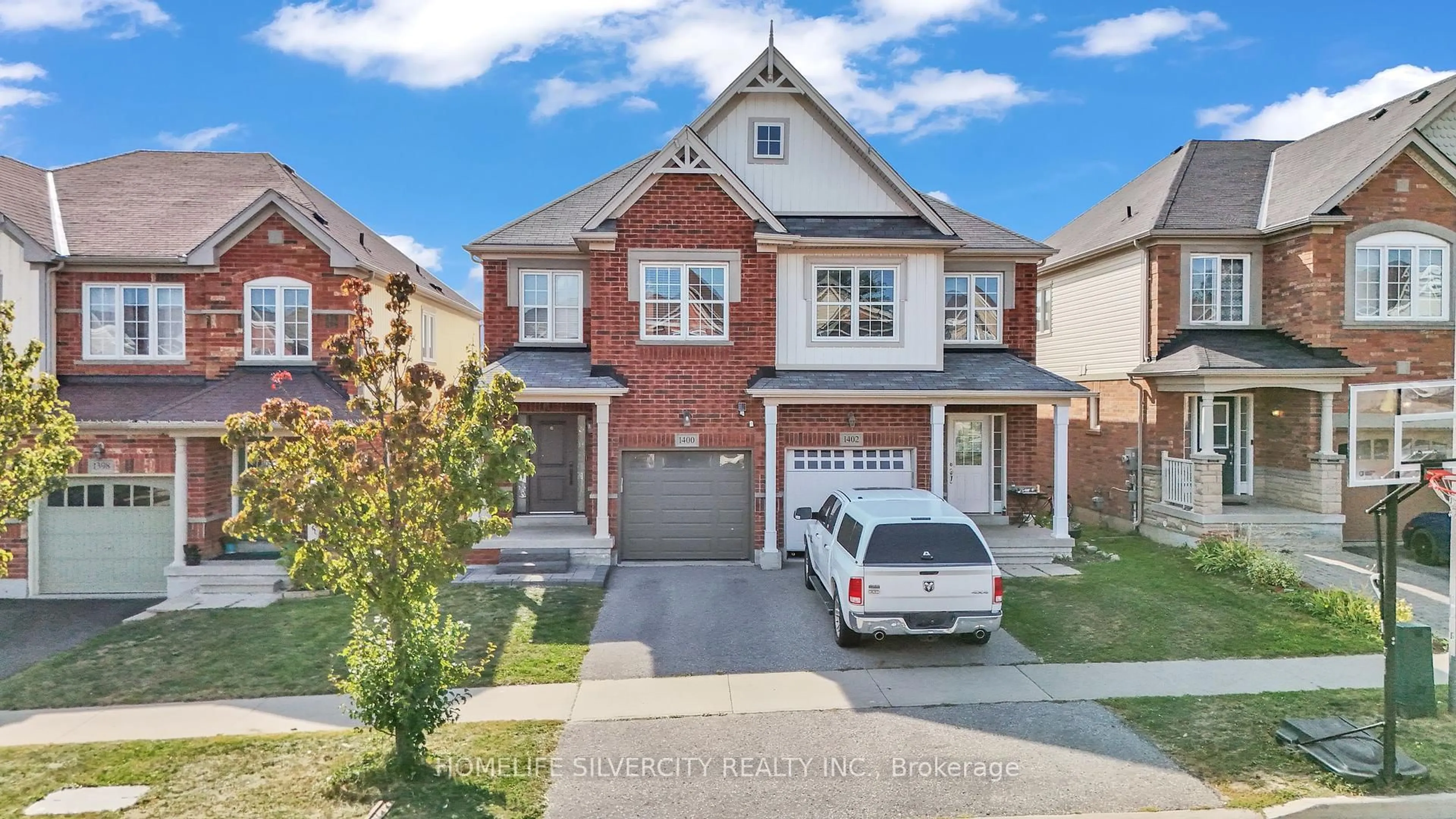 Home with brick exterior material, street for 1400 Rennie St, Oshawa Ontario L1K 0N8