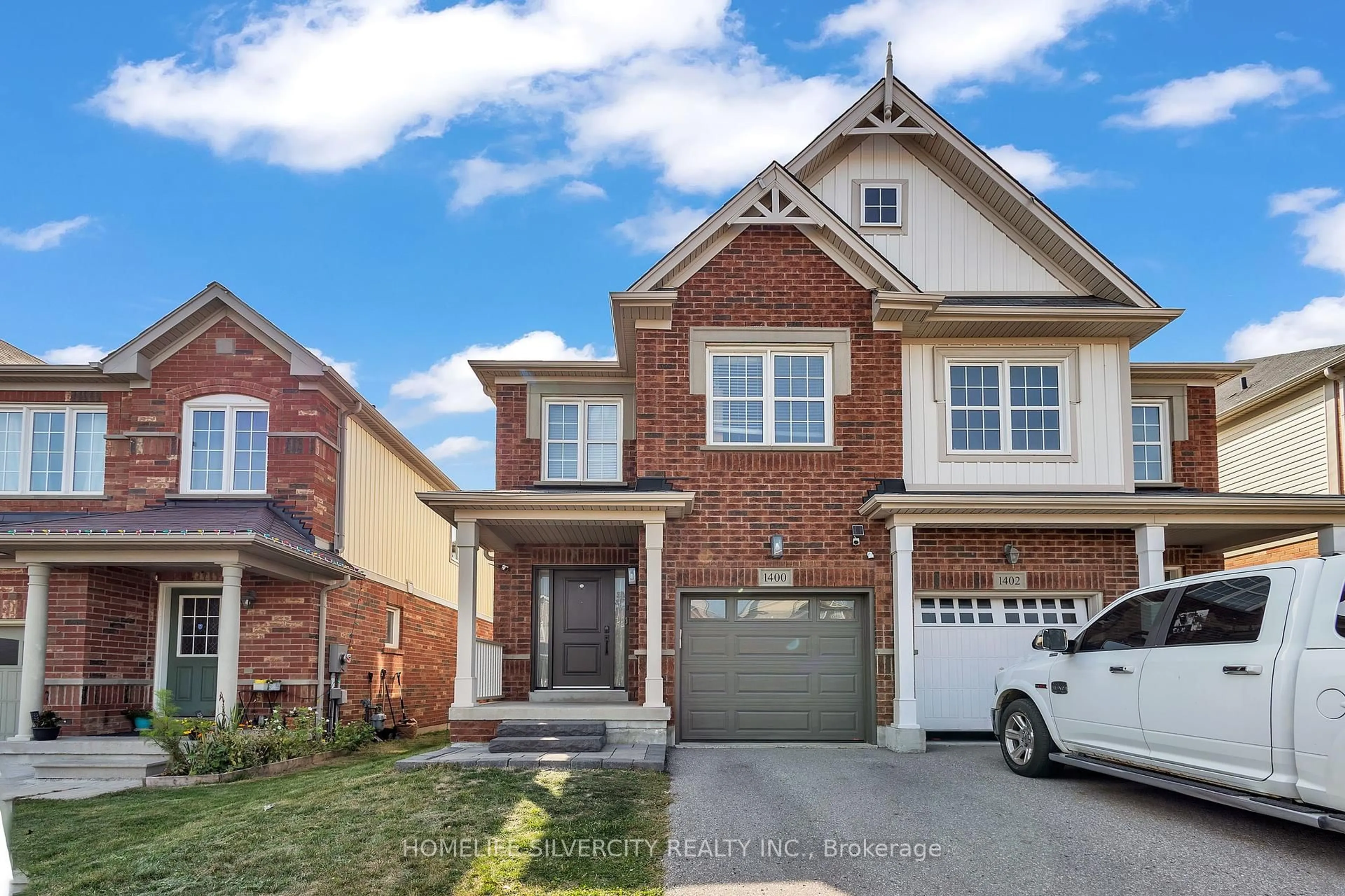 Home with brick exterior material, street for 1400 Rennie St, Oshawa Ontario L1K 0N8