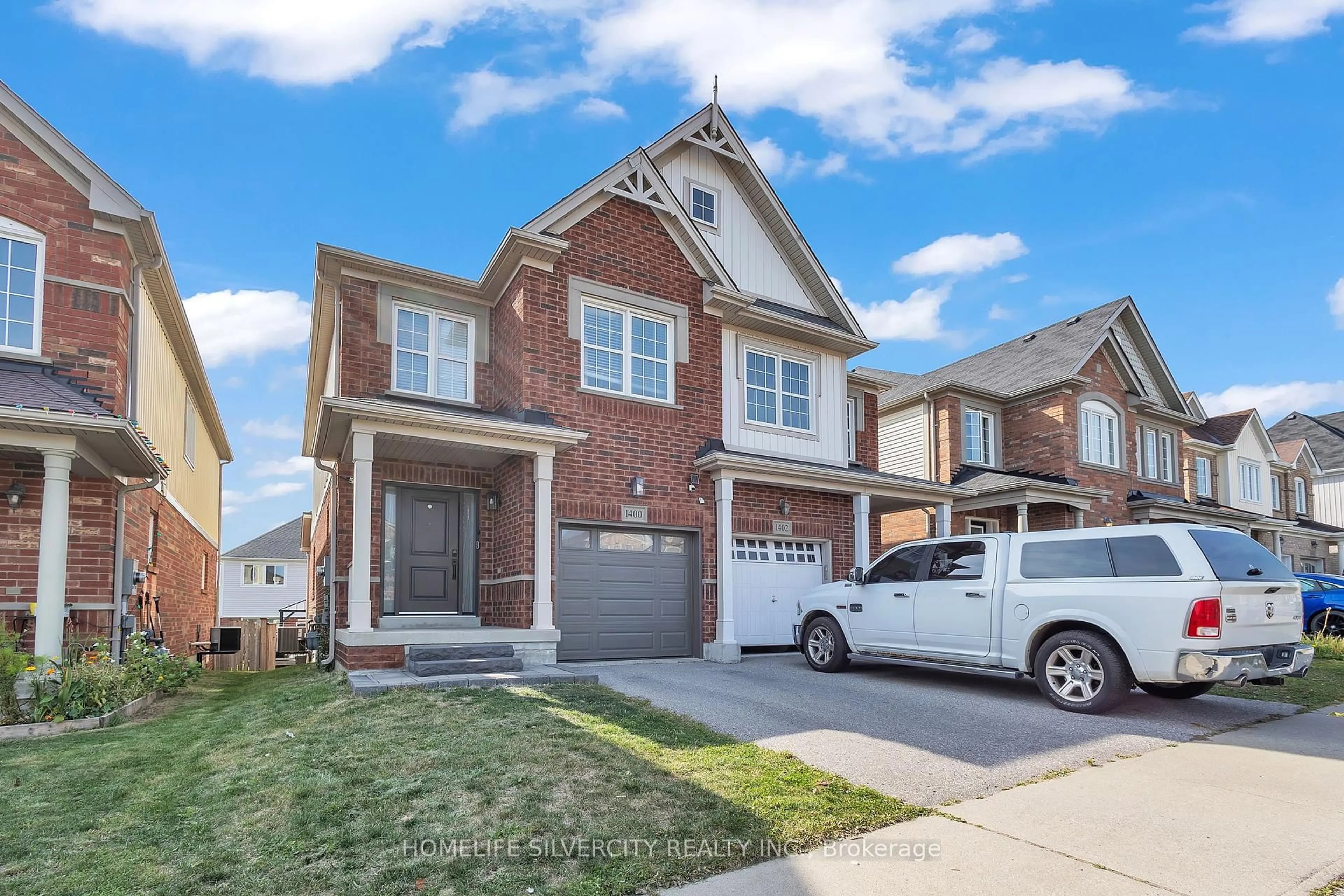 Home with brick exterior material, street for 1400 Rennie St, Oshawa Ontario L1K 0N8