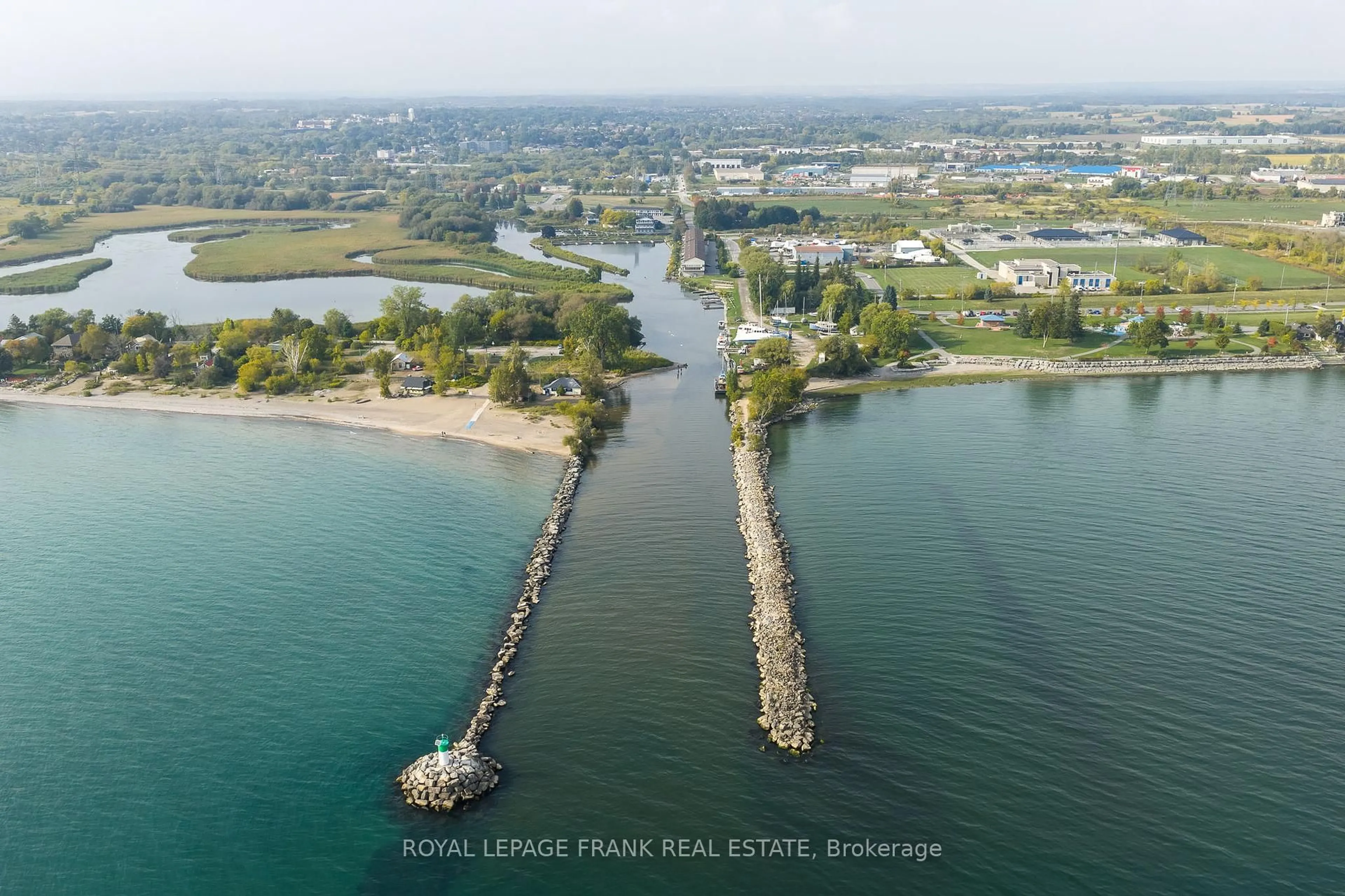 A pic from outside/outdoor area/front of a property/back of a property/a pic from drone, water/lake/river/ocean view for 120 Port Darlington Rd #15, Clarington Ontario L1C 3K3