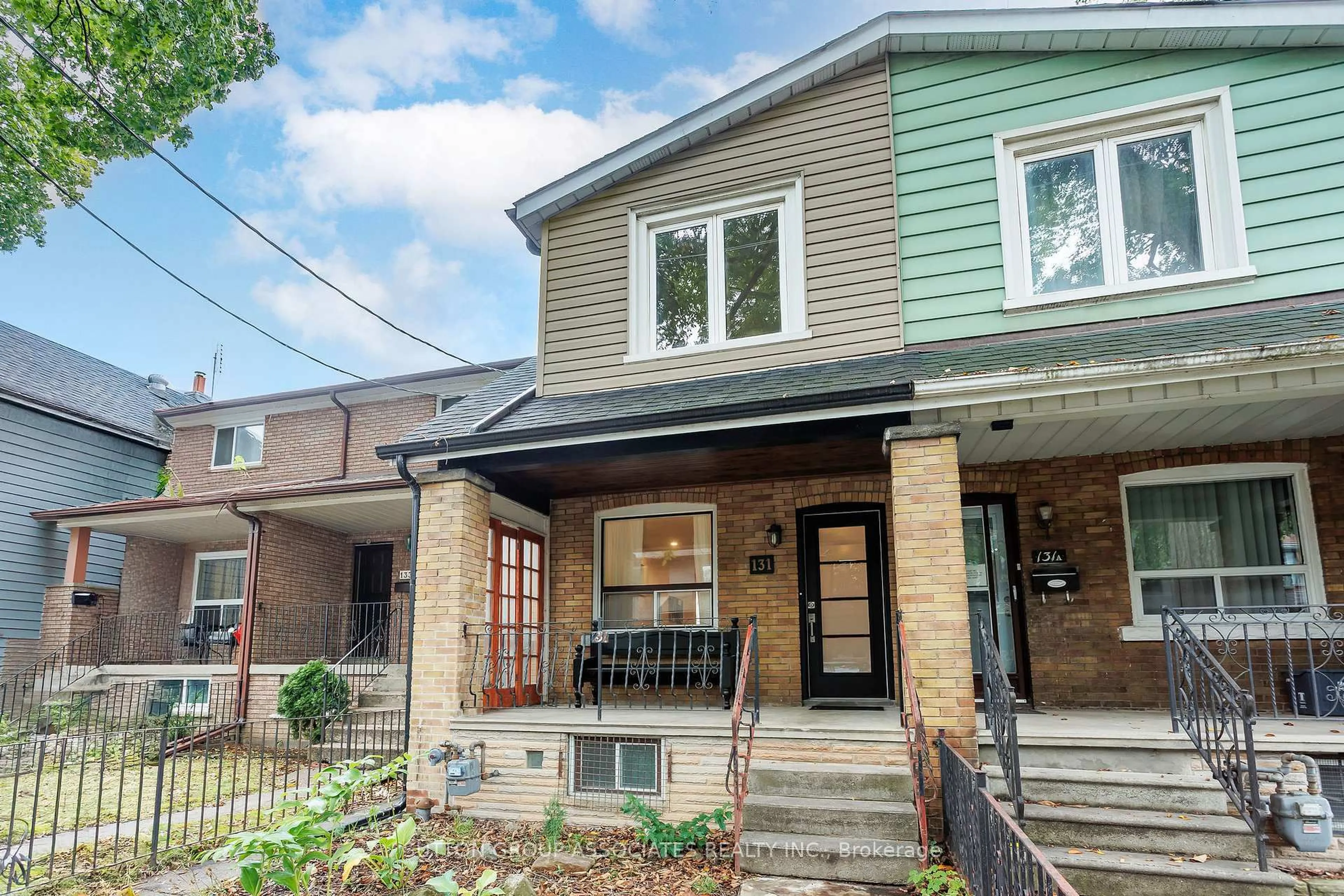 Home with brick exterior material, street for 131 Booth Ave, Toronto Ontario M4M 2M5