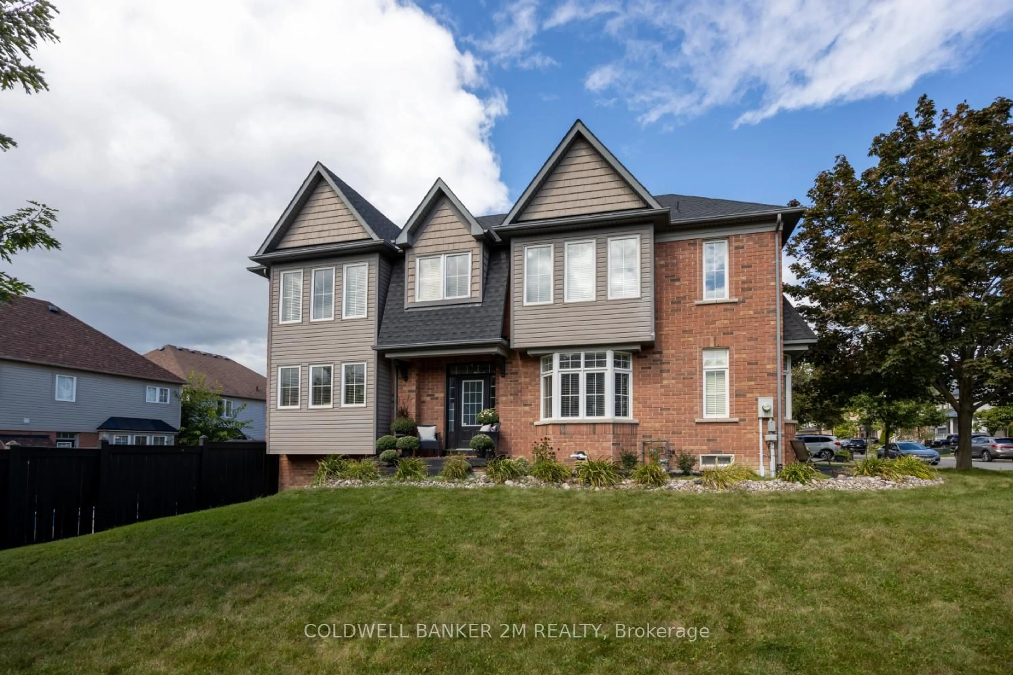 Home with brick exterior material, street for 2 Woodbine Pl, Oshawa Ontario L1L 1C5