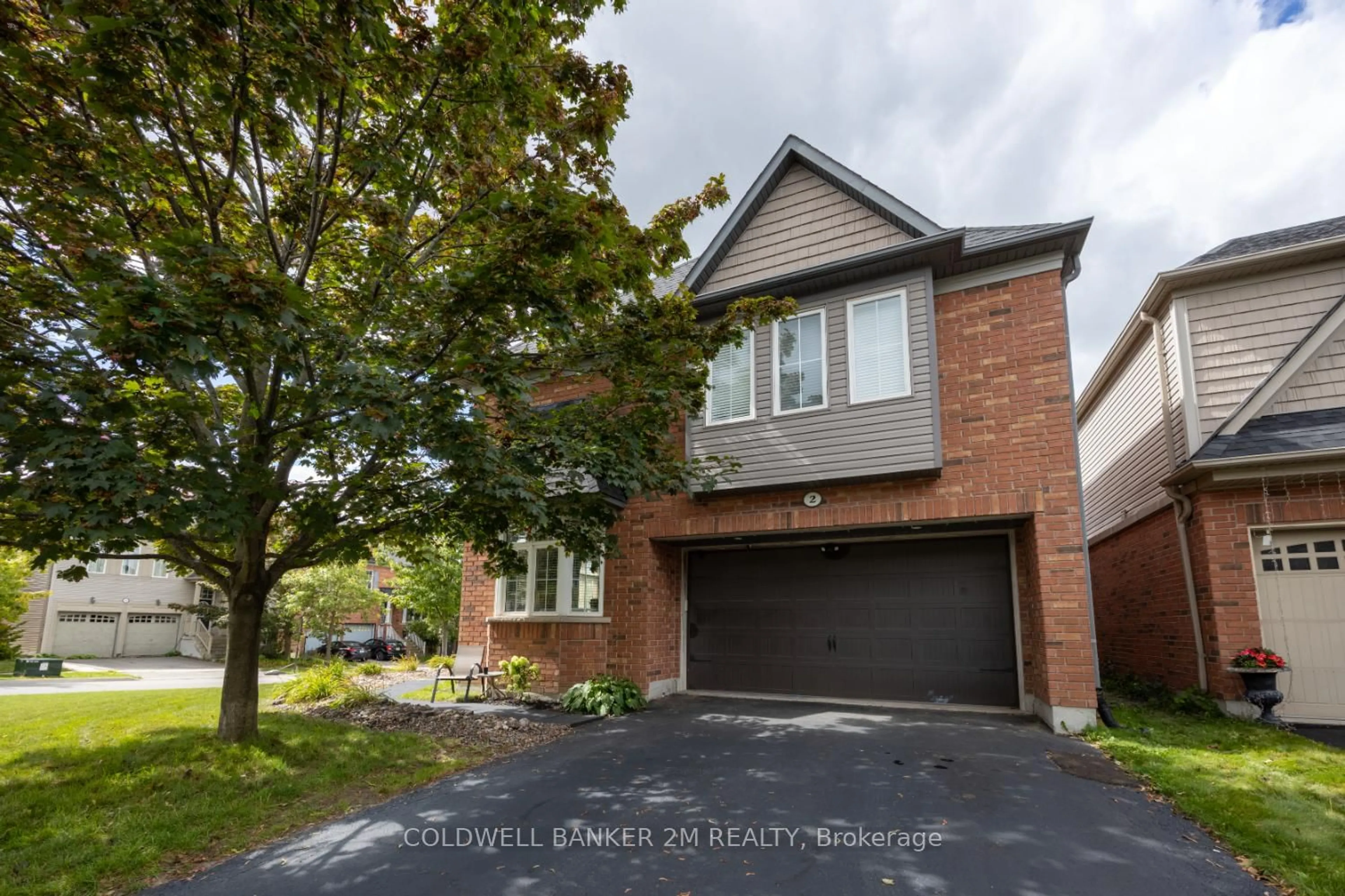 Home with brick exterior material, street for 2 Woodbine Pl, Oshawa Ontario L1L 1C5