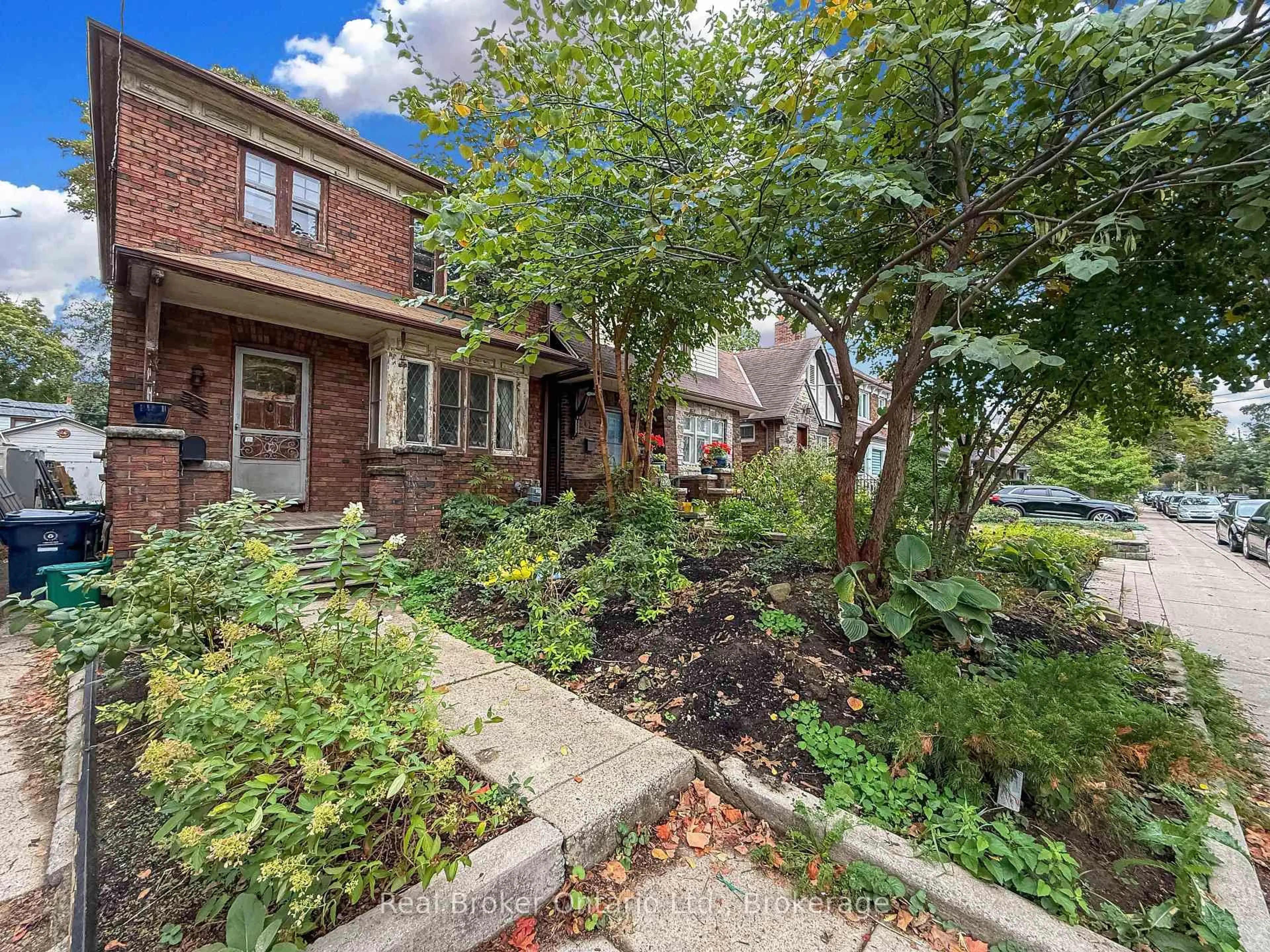 Home with brick exterior material, street for 55 Chilton Rd, Toronto Ontario M4J 3C7