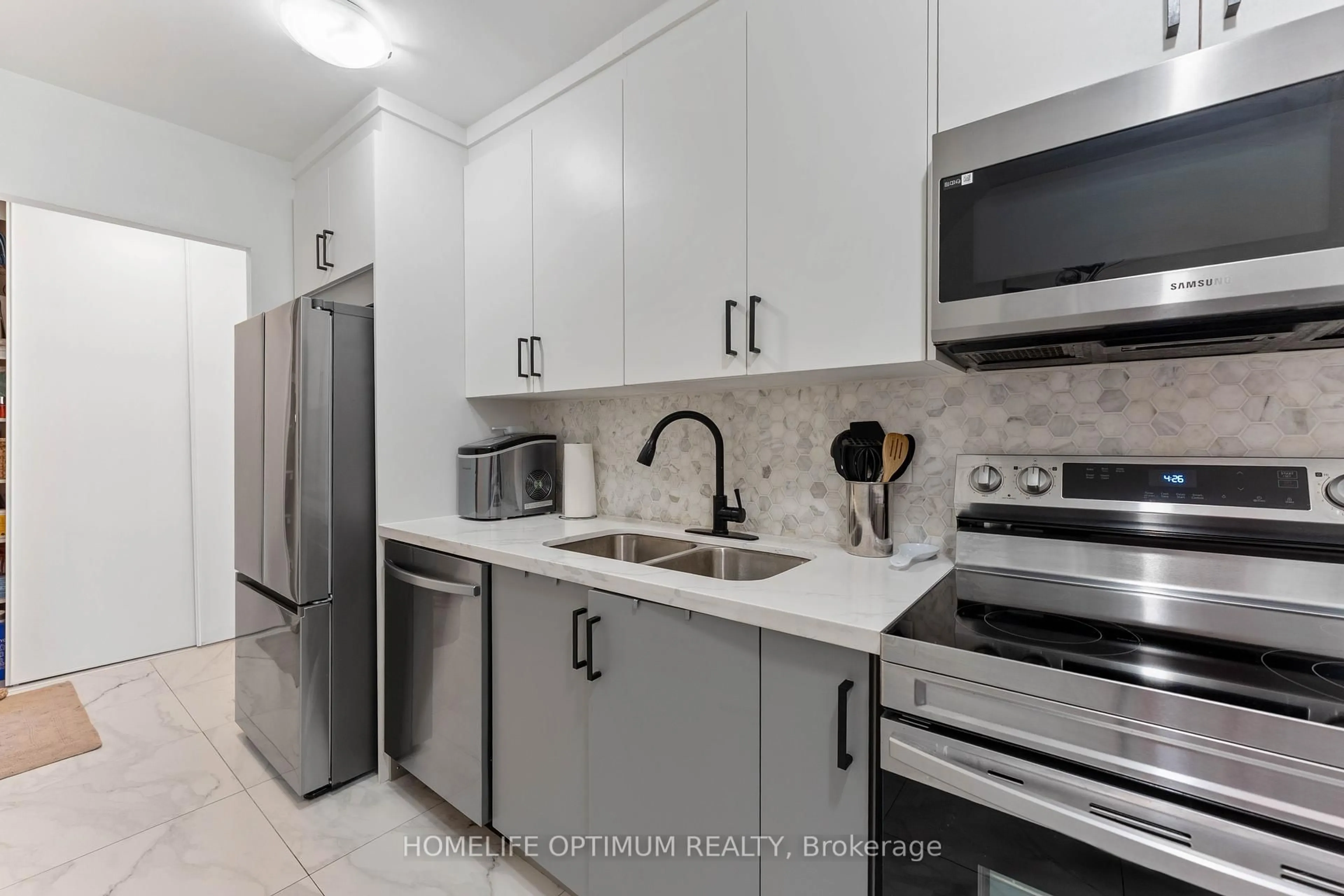 Standard kitchen, ceramic/tile floor for 100 Mornelle Crt #1076, Toronto Ontario M1E 4X2