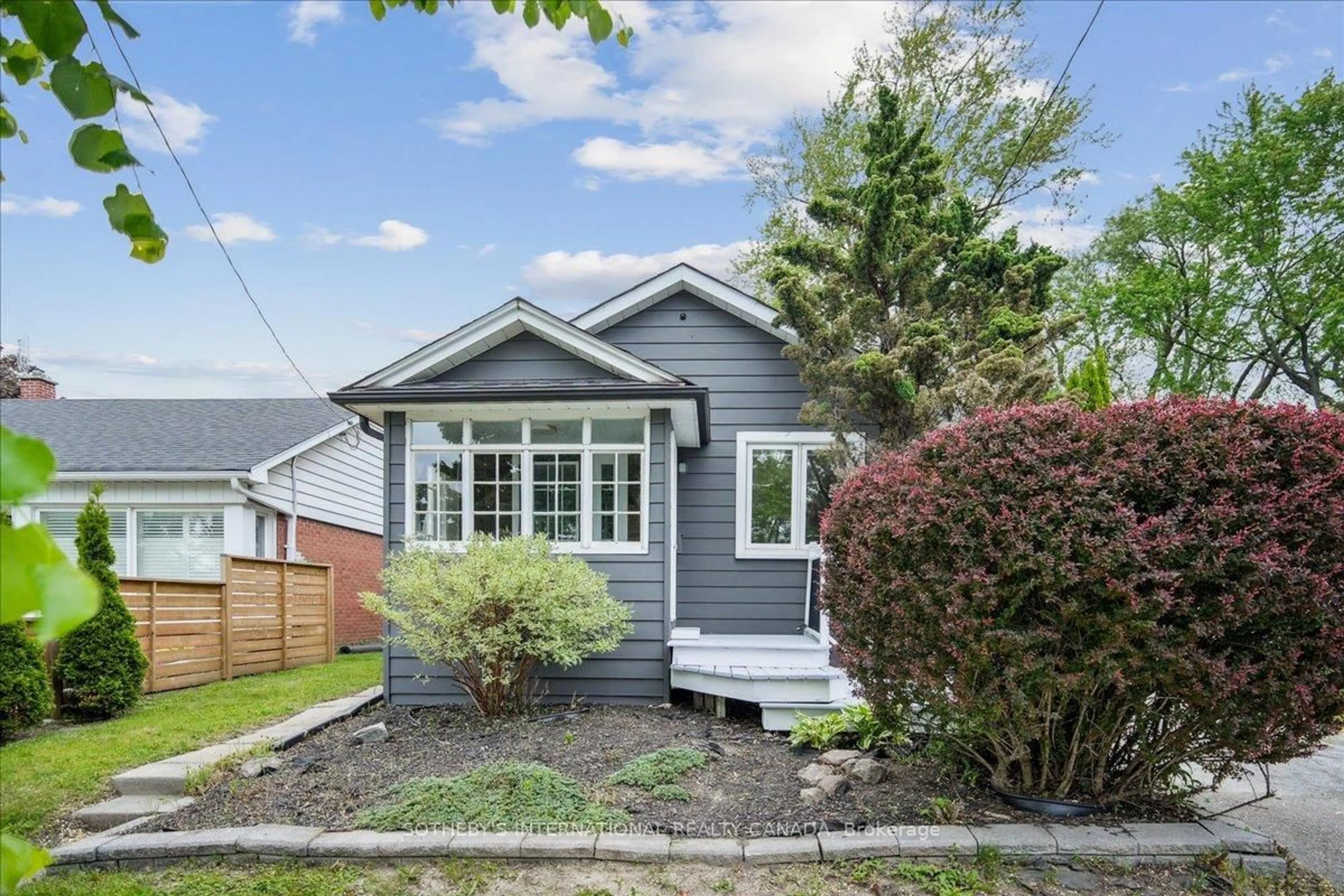 Home with vinyl exterior material, street for 3722 St. Clair Ave, Toronto Ontario M1M 1T6