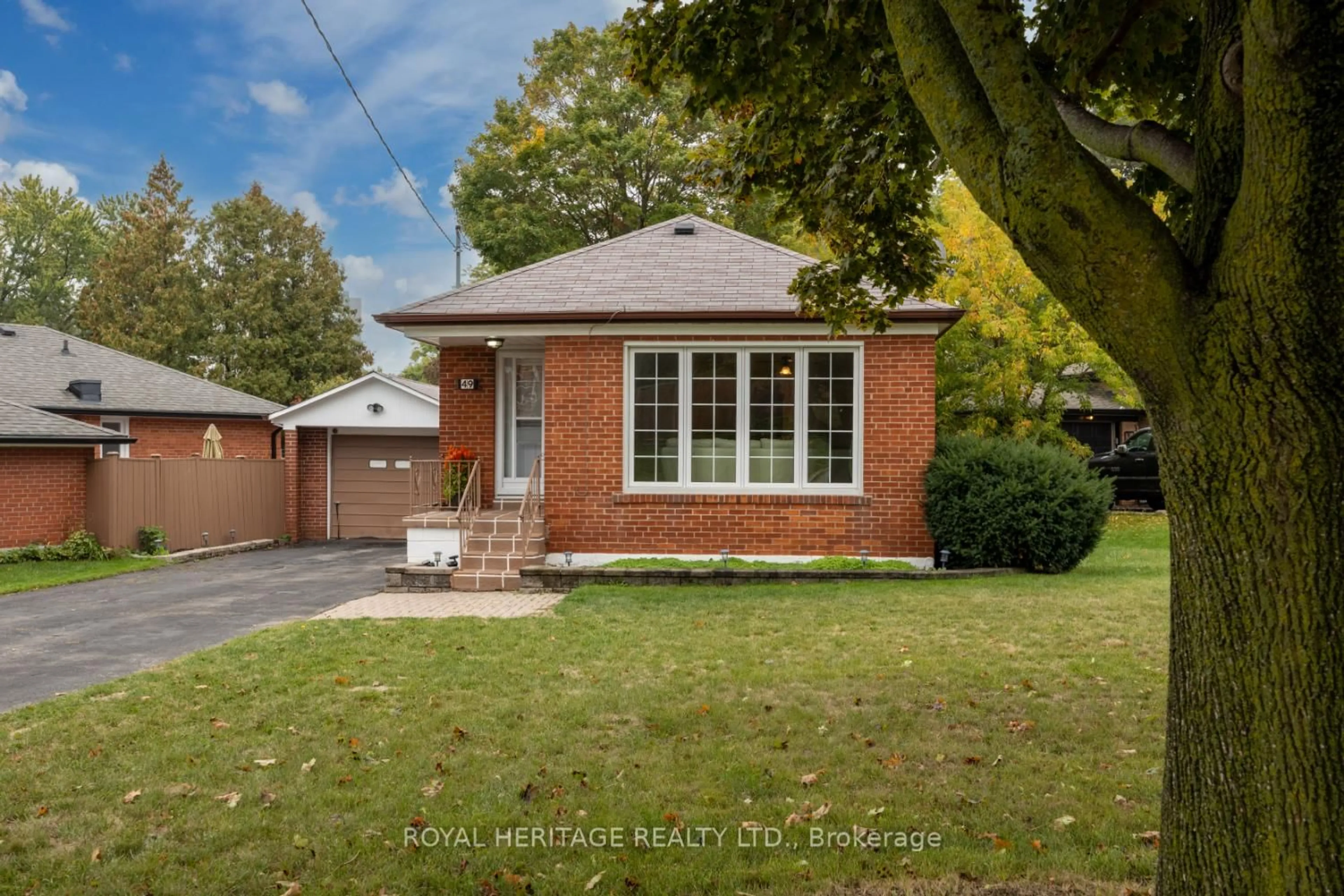 Home with brick exterior material, street for 49 Tansley Ave, Toronto Ontario M1J 1P2