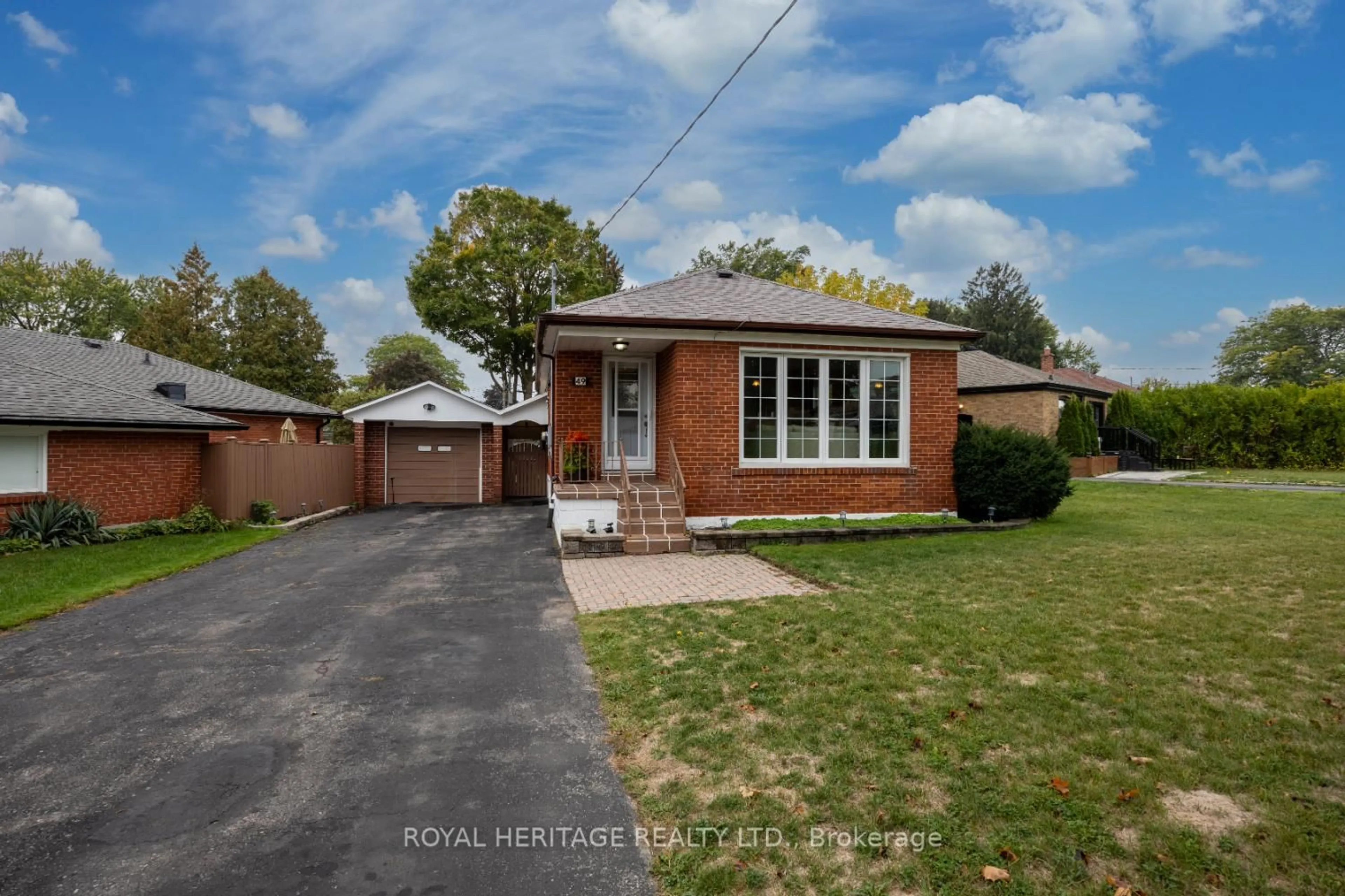 Home with brick exterior material, street for 49 Tansley Ave, Toronto Ontario M1J 1P2