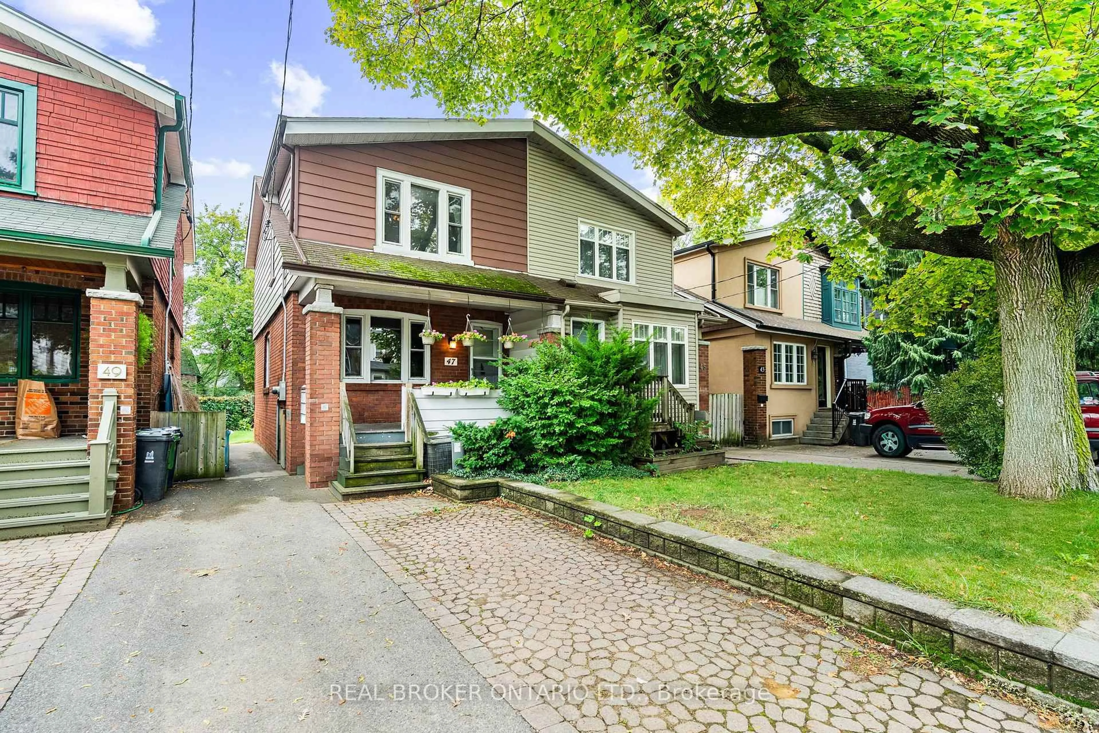 Home with brick exterior material, street for 47 Mortimer Ave, Toronto Ontario M4K 1Z9