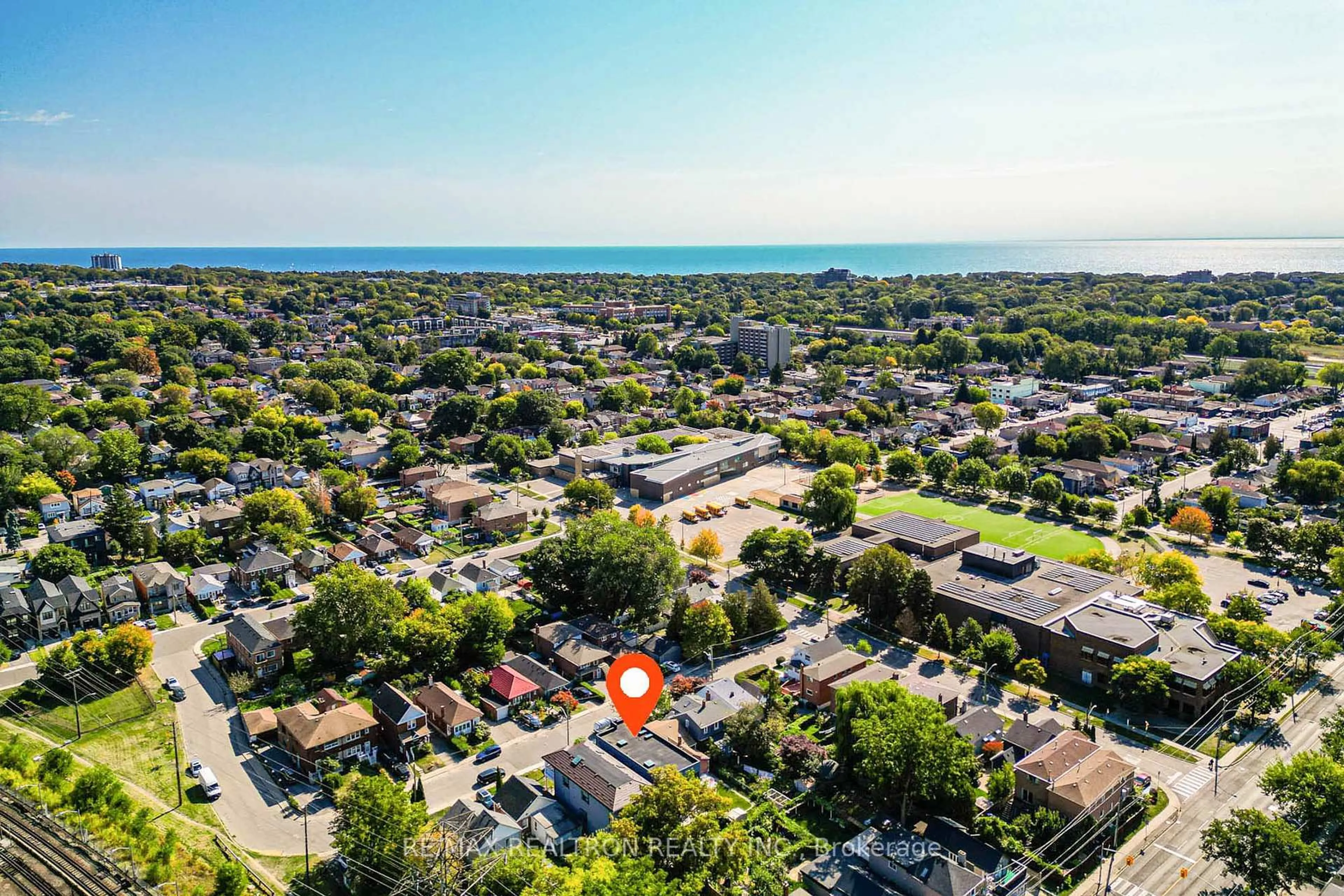 A pic from outside/outdoor area/front of a property/back of a property/a pic from drone, street for 94 Wanstead Ave, Toronto Ontario M1L 3L5