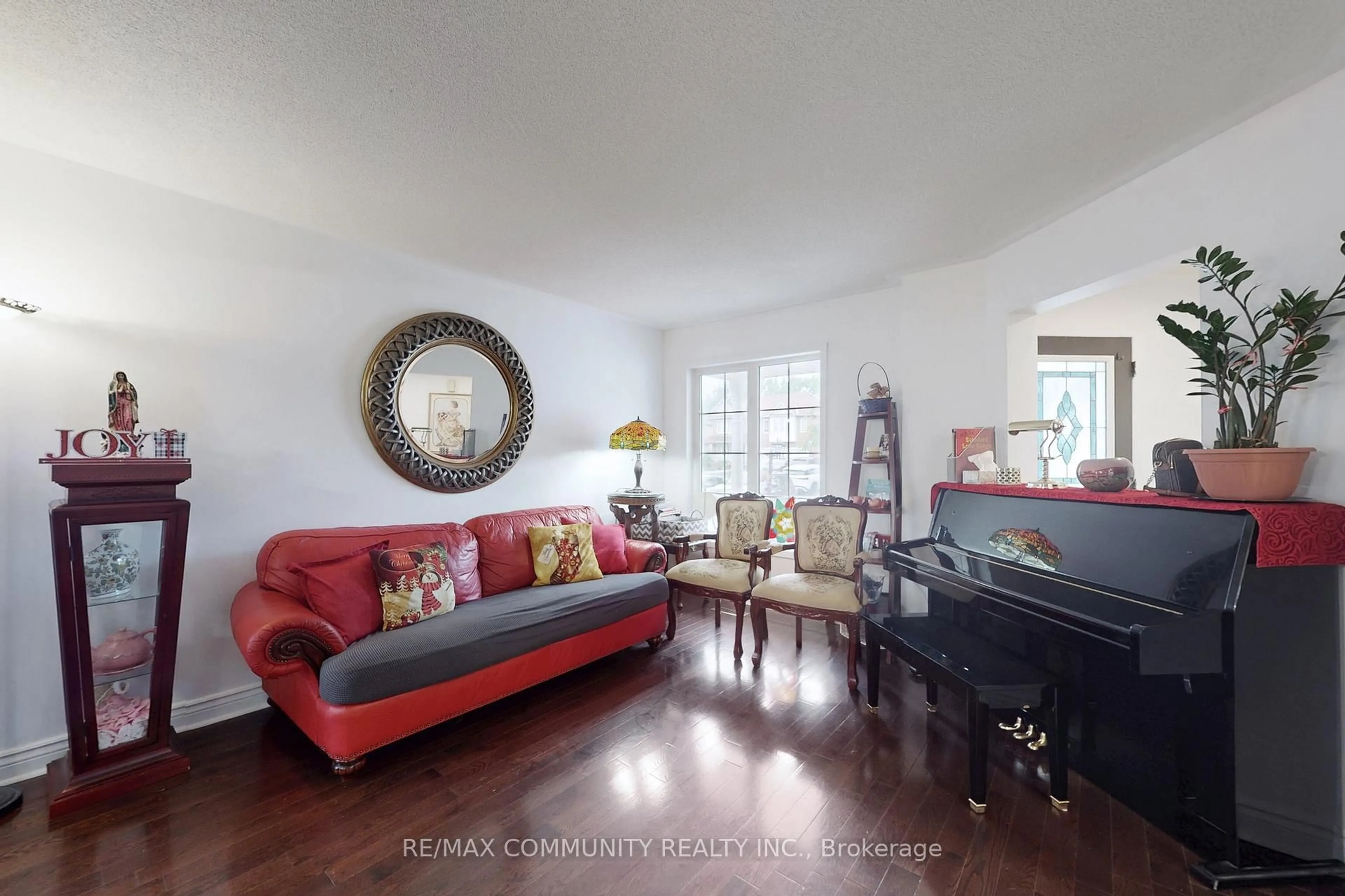 Living room with furniture, unknown for 71 Hibbard Dr, Ajax Ontario L1Z 1J8