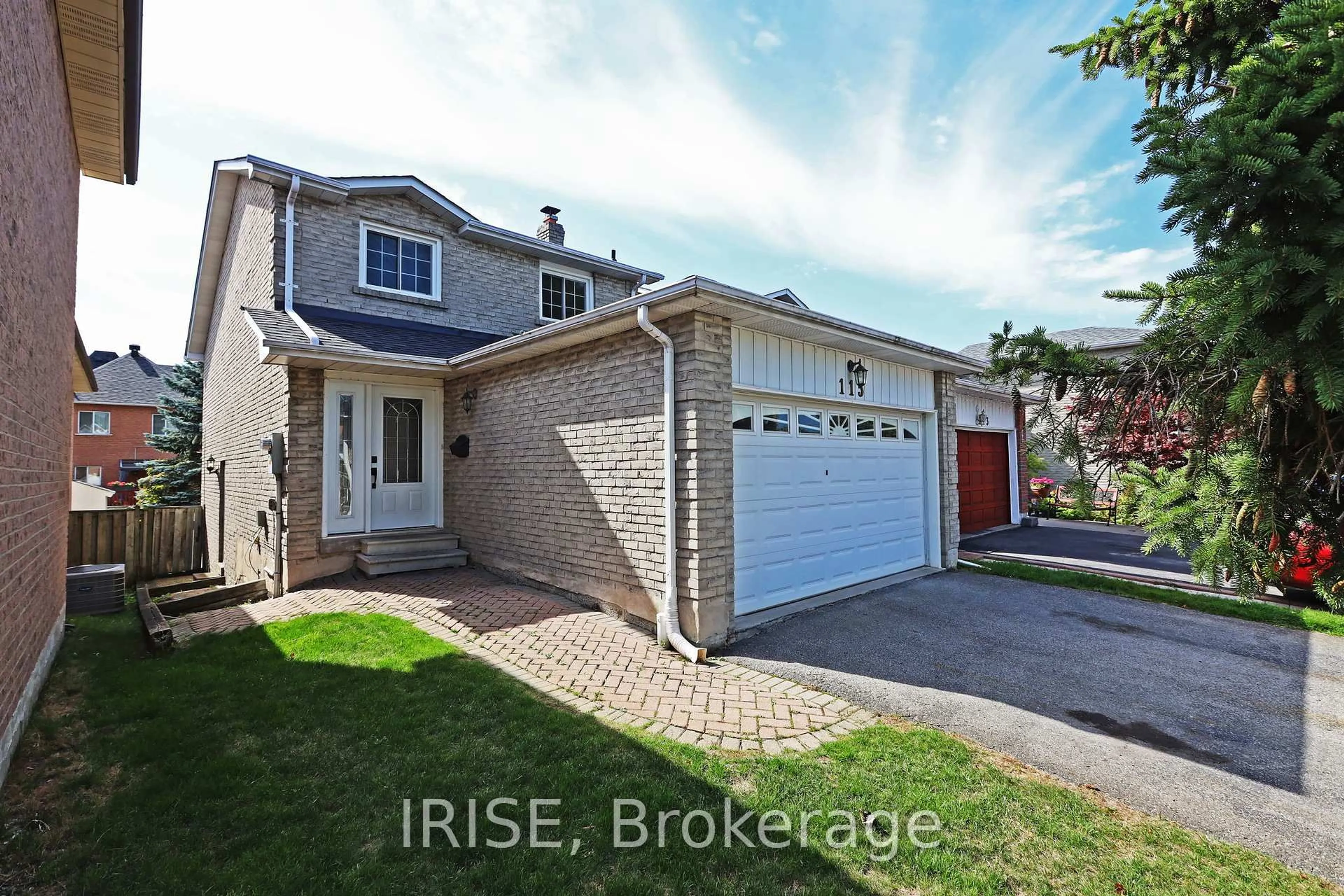 Home with brick exterior material, street for 115 Winter Gardens Tr, Toronto Ontario M1C 3M9
