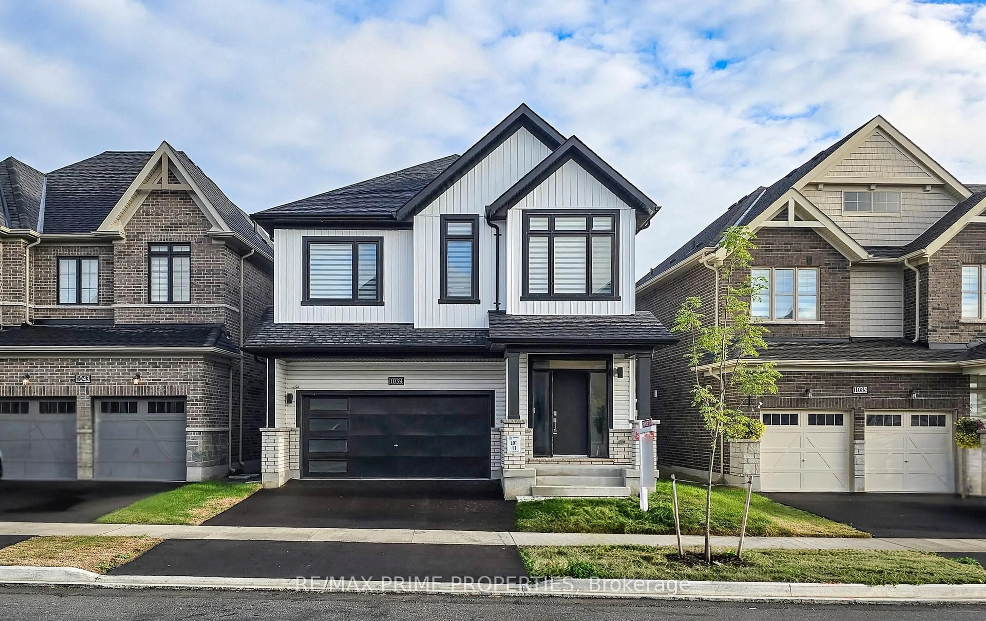 Home with brick exterior material, street for 1039 Thompson Dr, Oshawa Ontario L1L 0V6