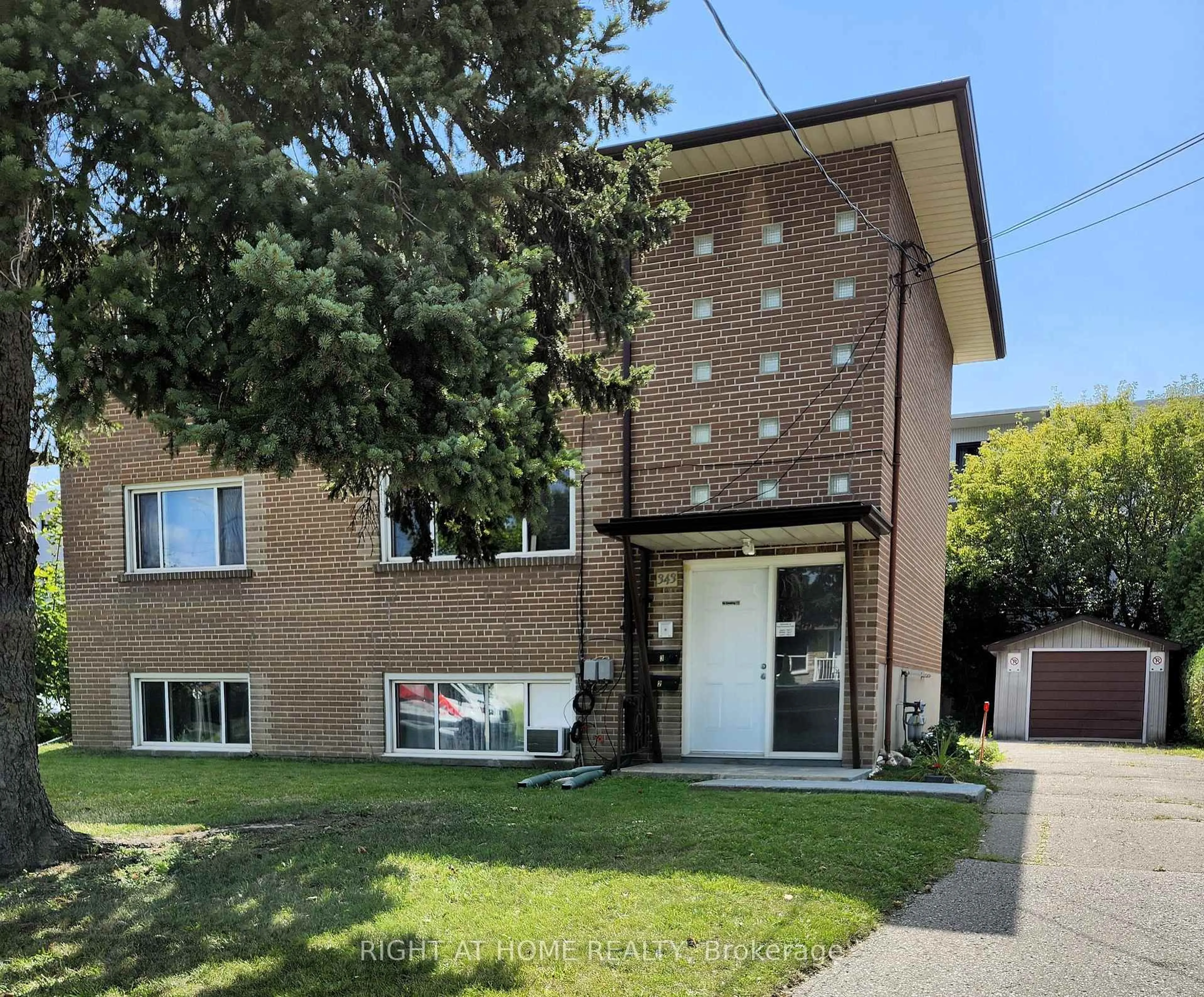 Home with brick exterior material, street for 343 Frontenac Ave, Oshawa Ontario L1J 2A7