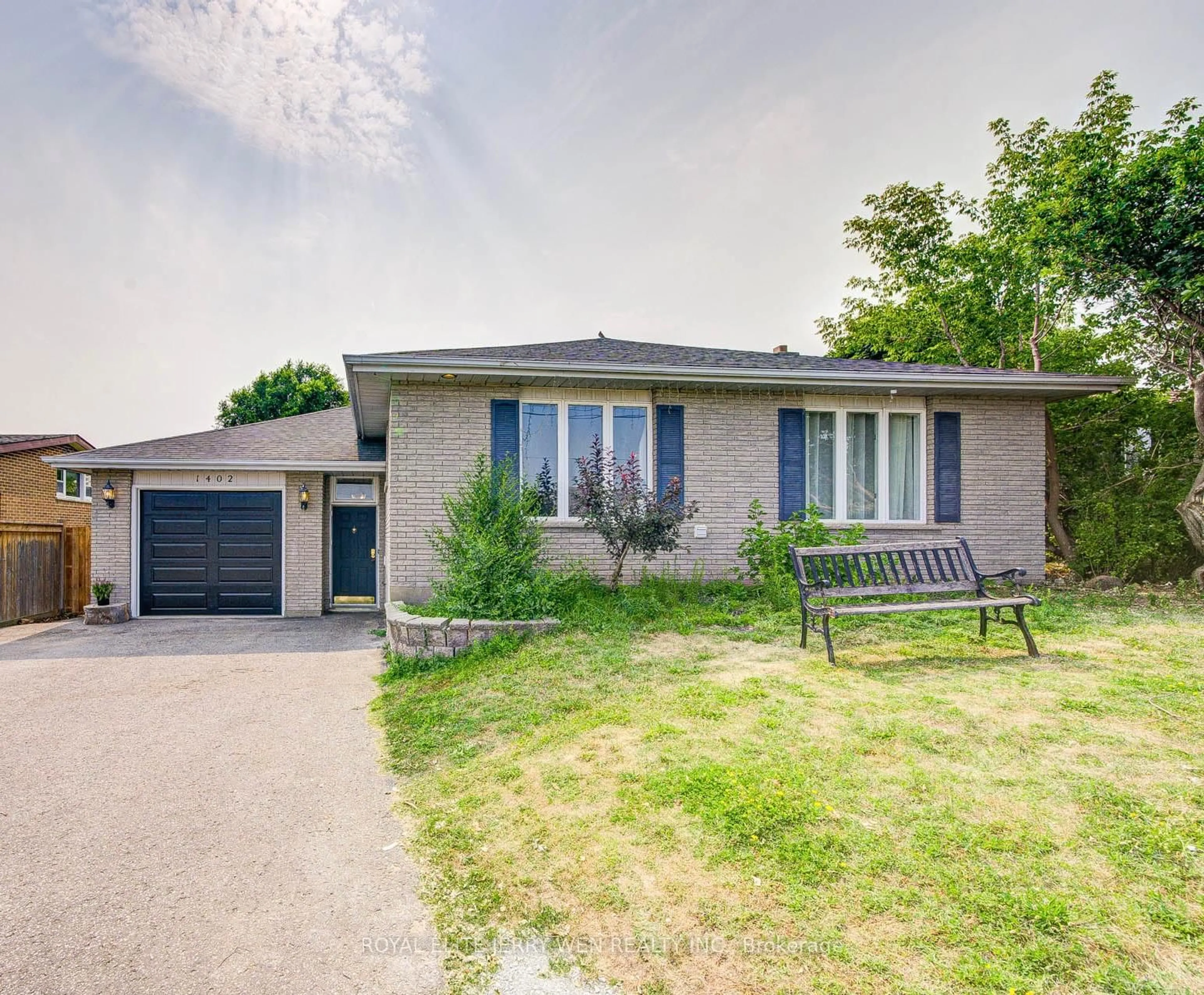 Home with brick exterior material, street for 1402 Wilson Rd, Oshawa Ontario L1K 2B9