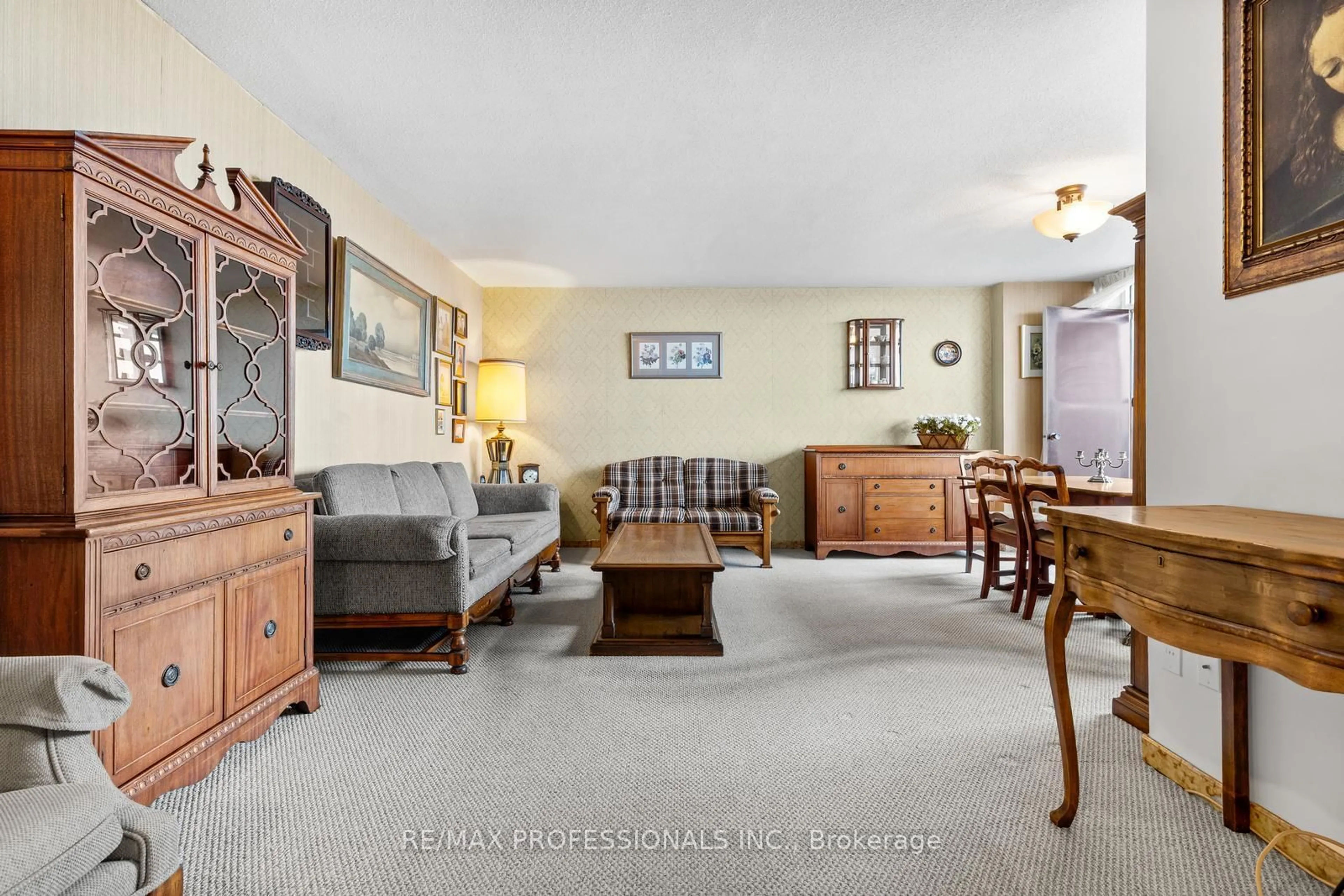 Living room with furniture, unknown for 180 Markham Rd #1704, Toronto Ontario M1M 2Z9