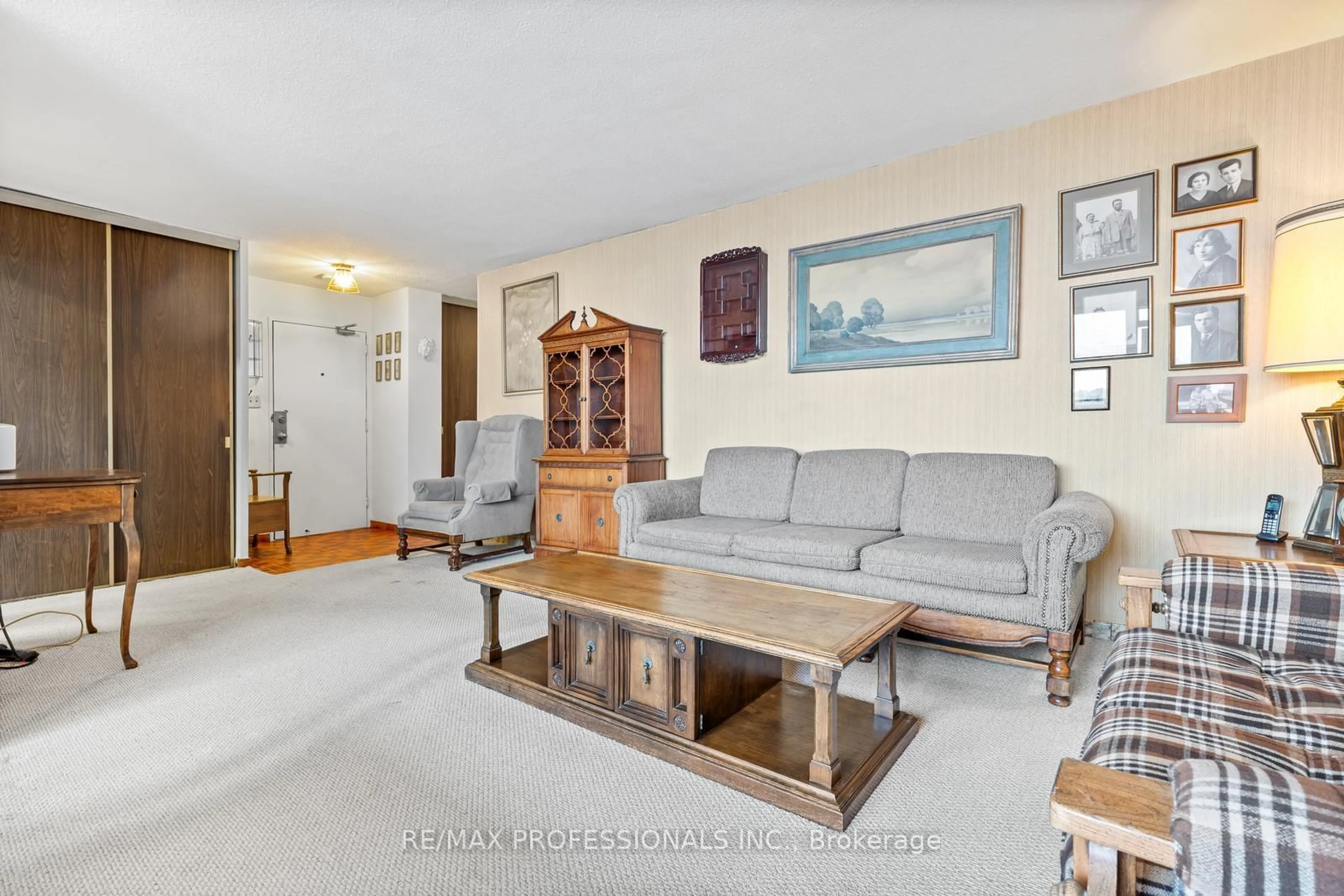 Living room with furniture, unknown for 180 Markham Rd #1704, Toronto Ontario M1M 2Z9