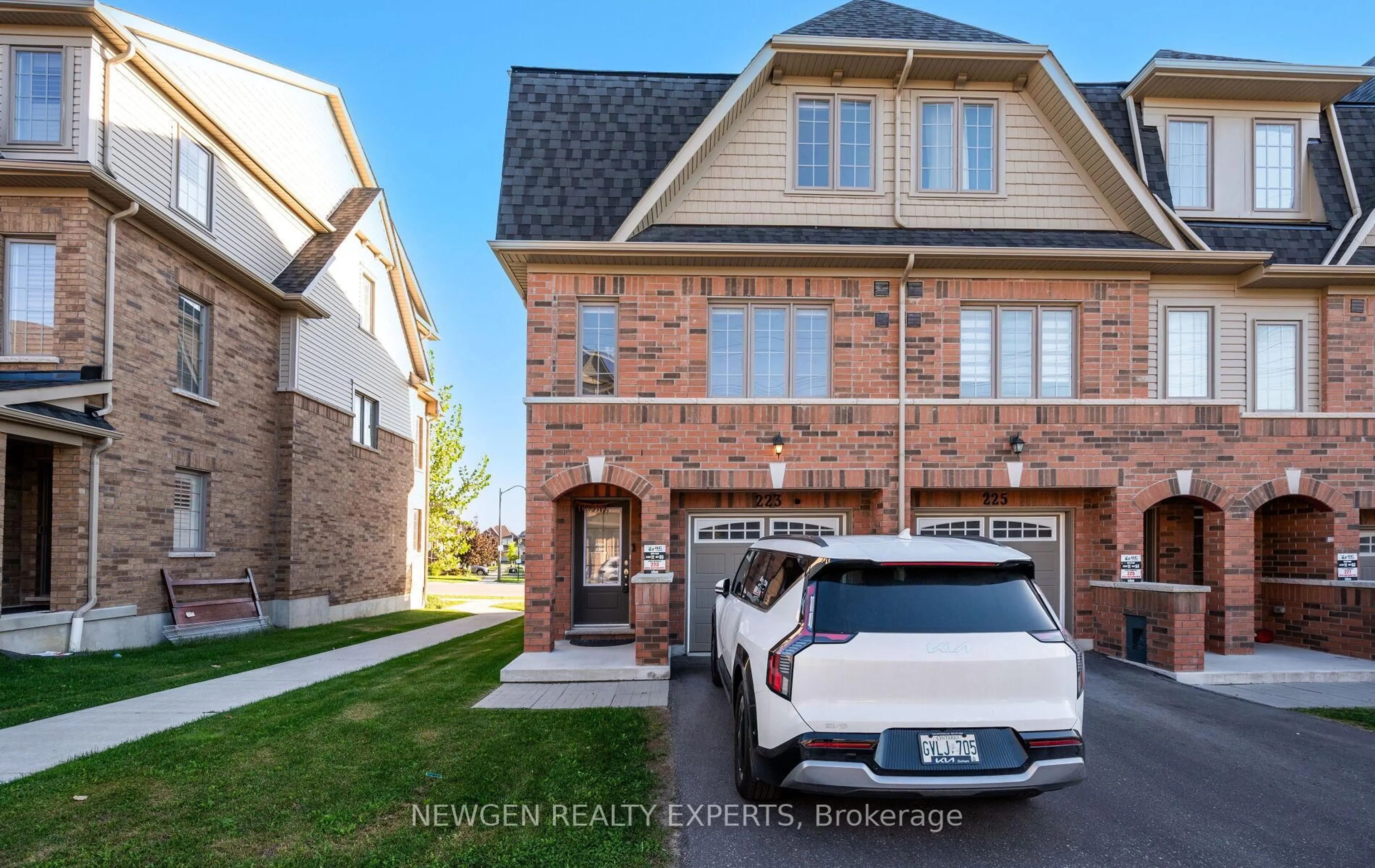 Home with brick exterior material, street for 223 Royal Northern Path, Oshawa Ontario L1L 0R6
