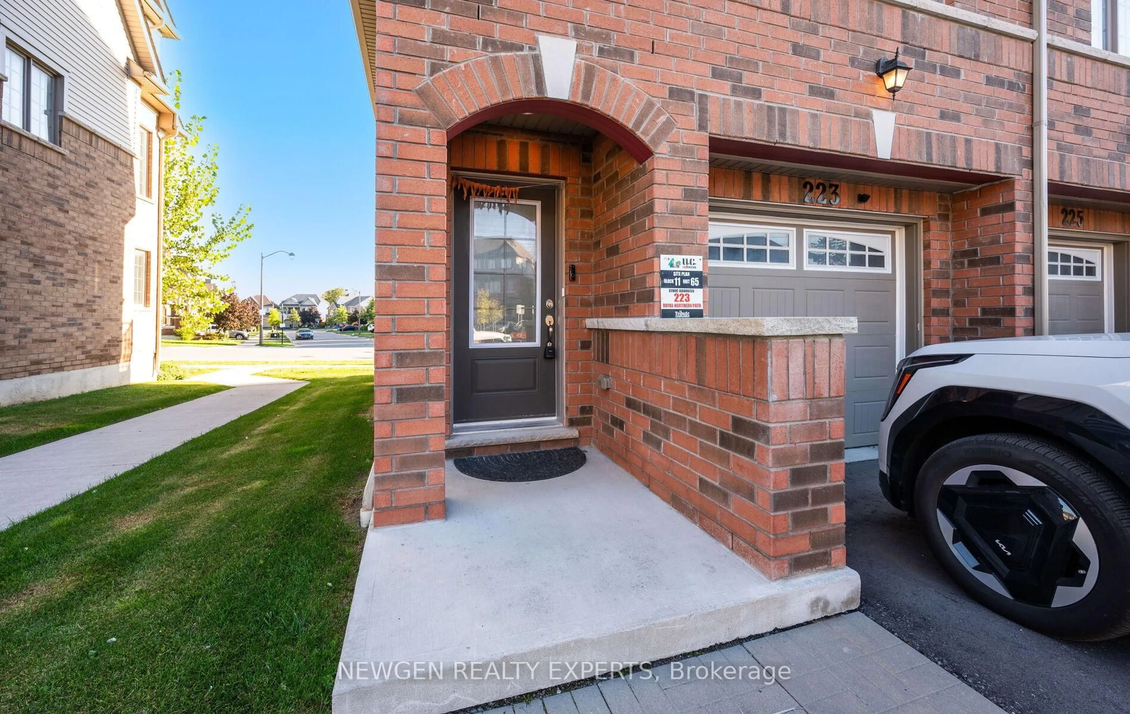 Home with brick exterior material, street for 223 Royal Northern Path, Oshawa Ontario L1L 0R6
