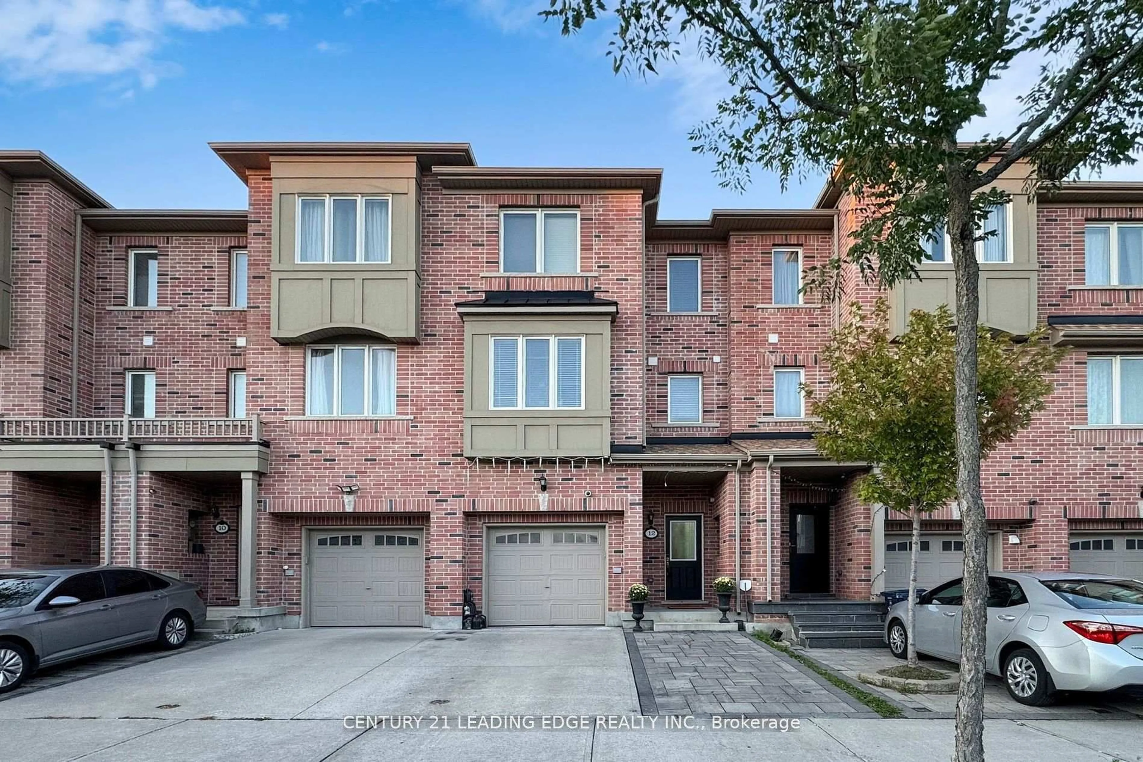 Home with brick exterior material, street for 12 Pringdale Gardens Circ, Toronto Ontario M1J 0B1