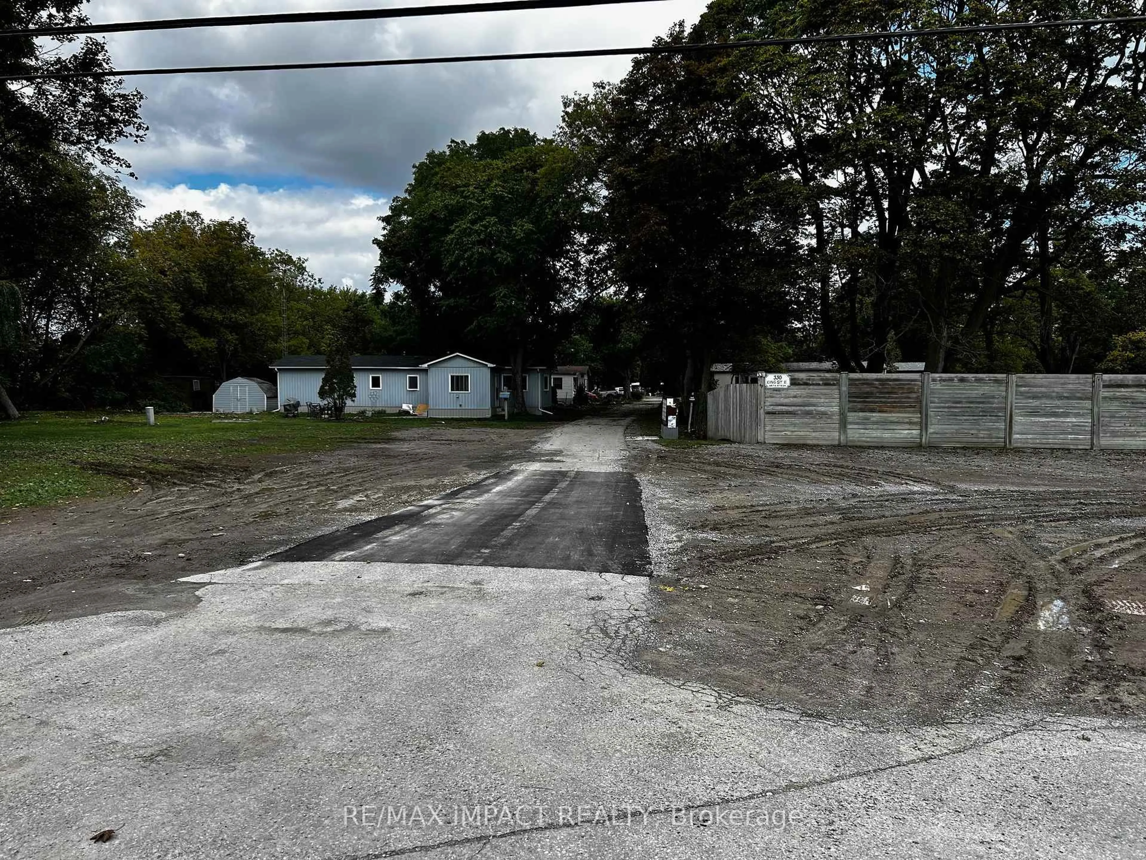 A pic from outside/outdoor area/front of a property/back of a property/a pic from drone, street for 300 King St #23, Clarington Ontario L1C 3K5