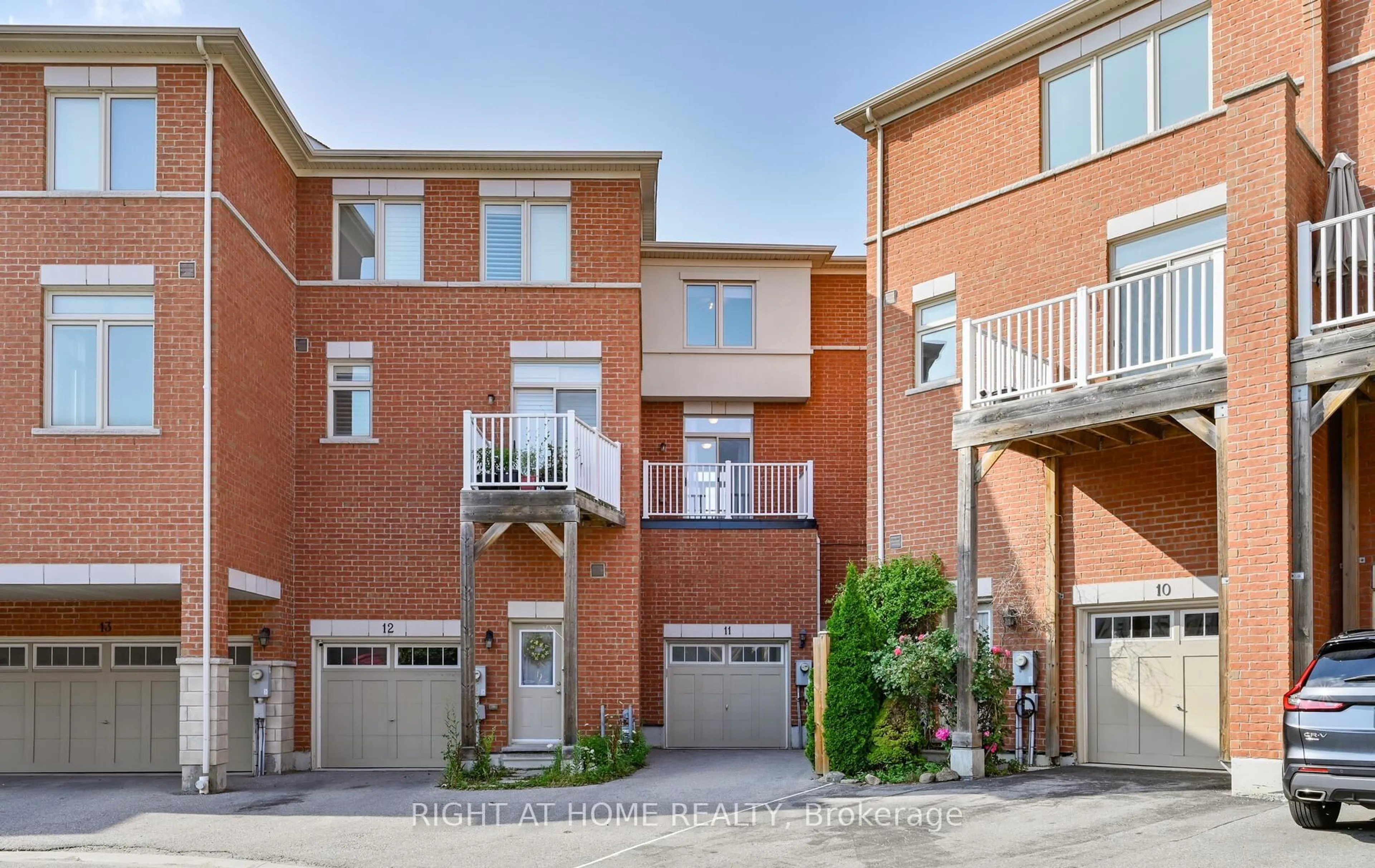 Home with brick exterior material, street for 1299 Glenanna Rd #11, Pickering Ontario L1V 3B7