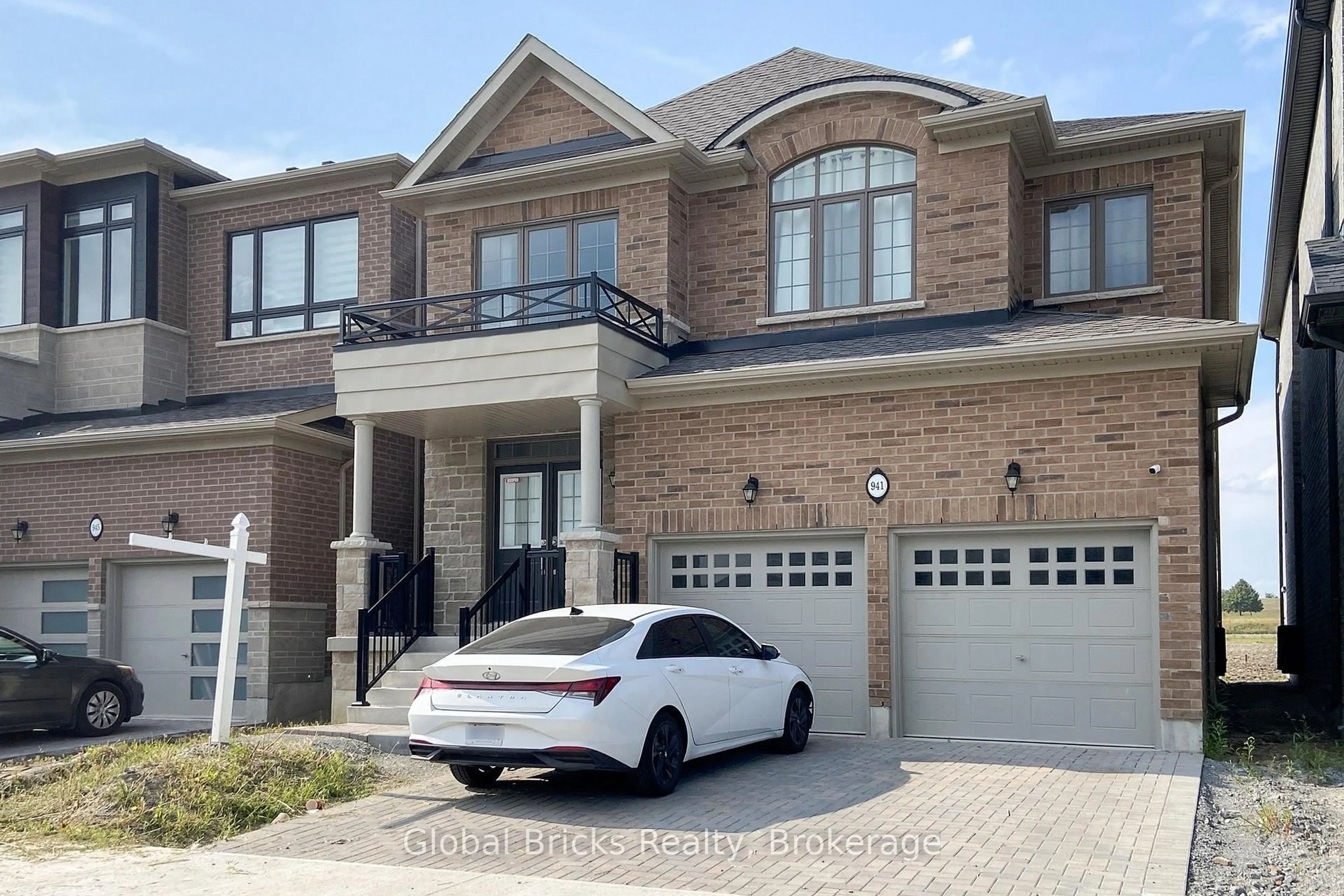 Home with brick exterior material, street for 941 Rexton Dr, Oshawa Ontario L1L 0V1