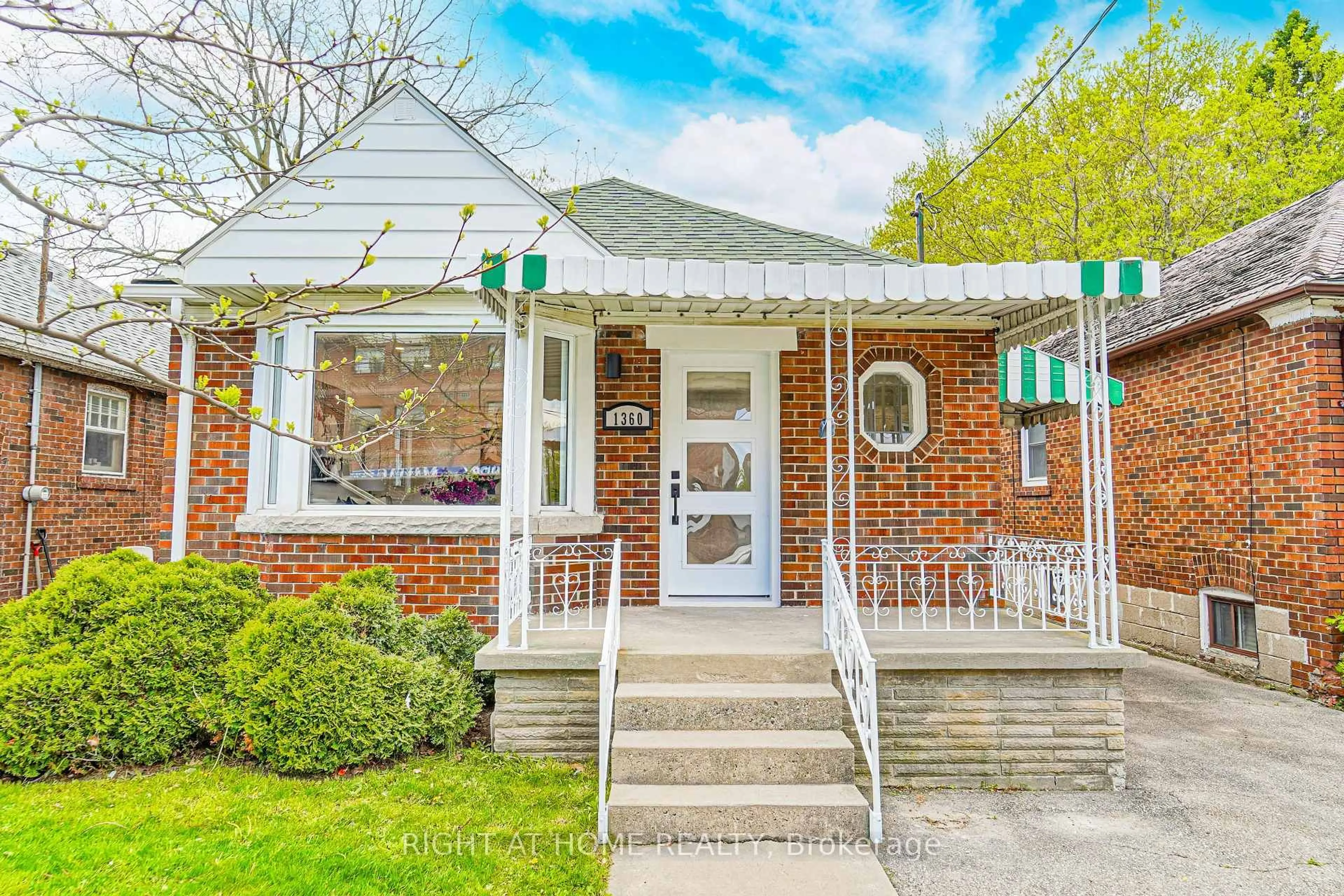Home with brick exterior material, street for 1360 Woodbine Ave, Toronto Ontario M4C 4G5