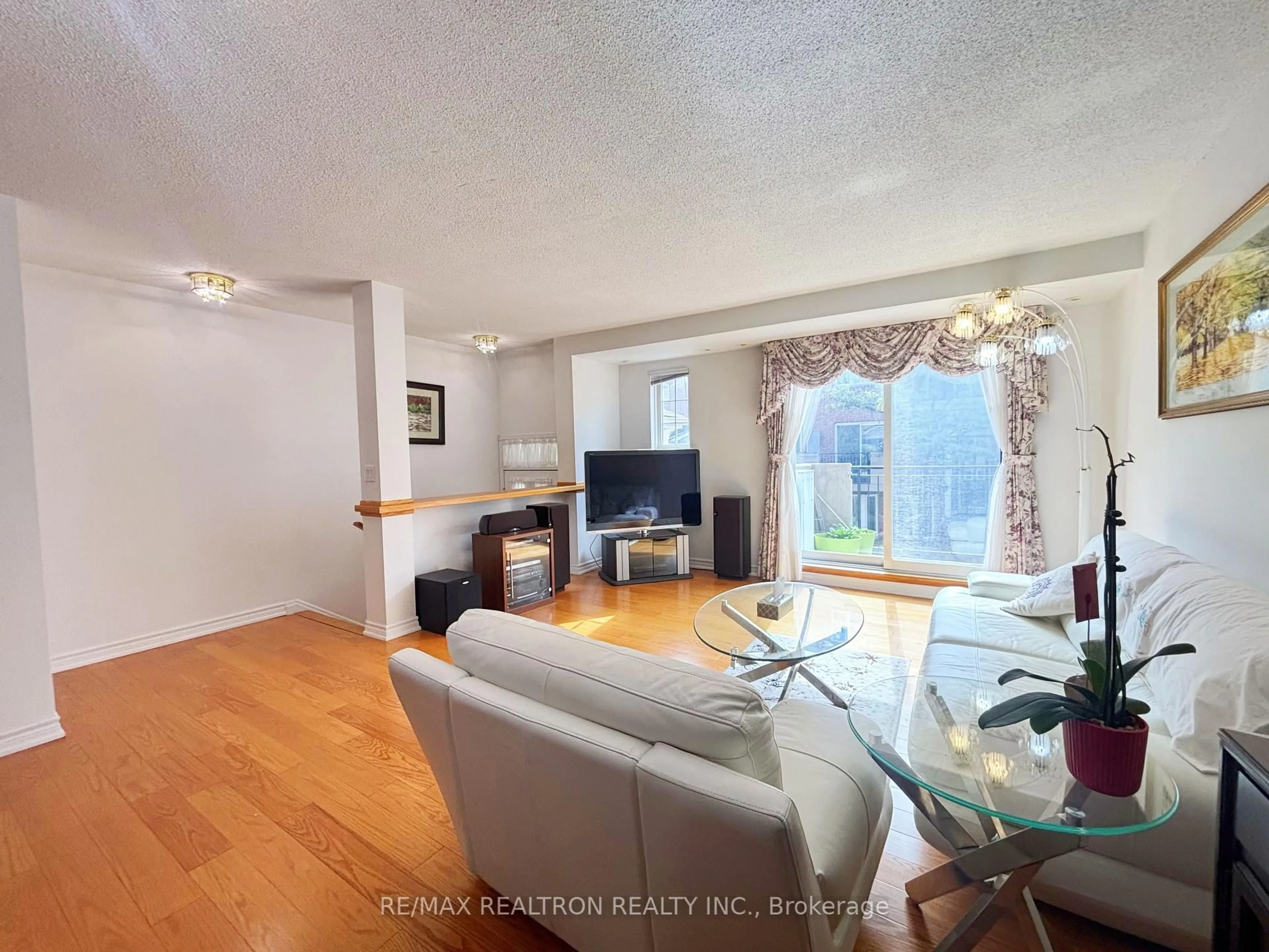 Living room with furniture, unknown for 1881 McNicoll Ave #303, Toronto Ontario M1V 5M2