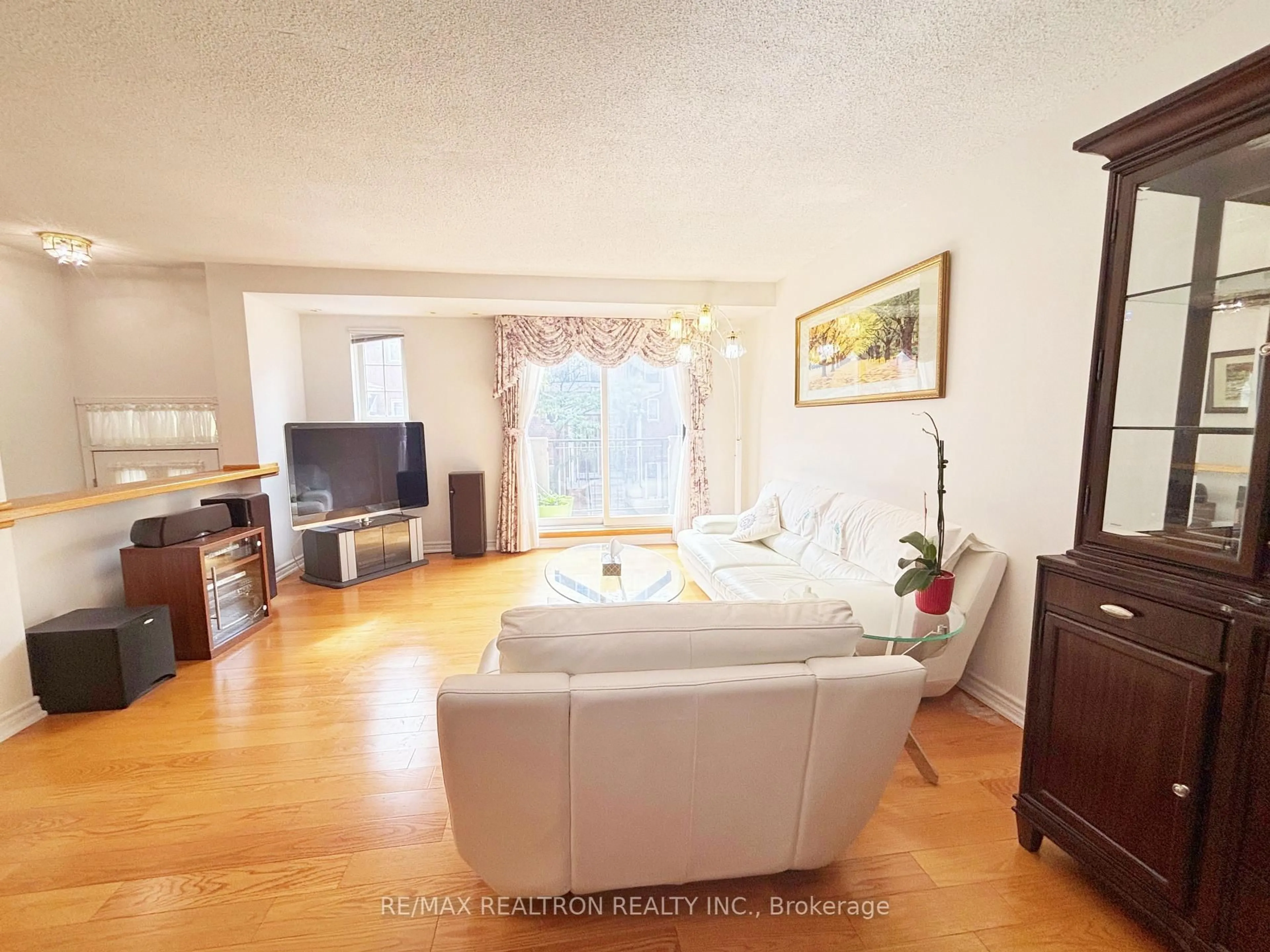 Living room with furniture, unknown for 1881 McNicoll Ave #303, Toronto Ontario M1V 5M2