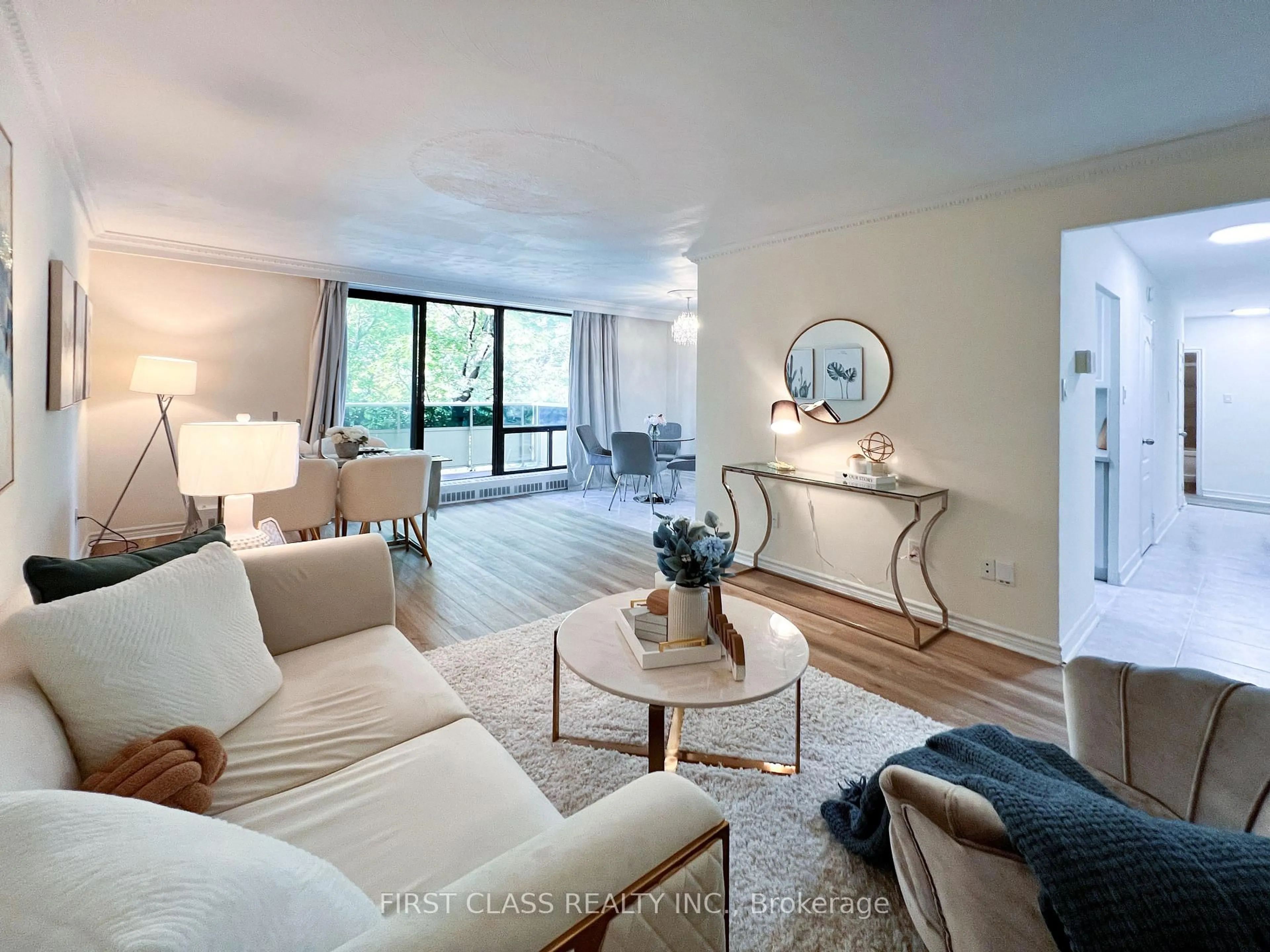 Living room with furniture, unknown for 921 Midland Ave #205, Toronto Ontario M1K 4G2