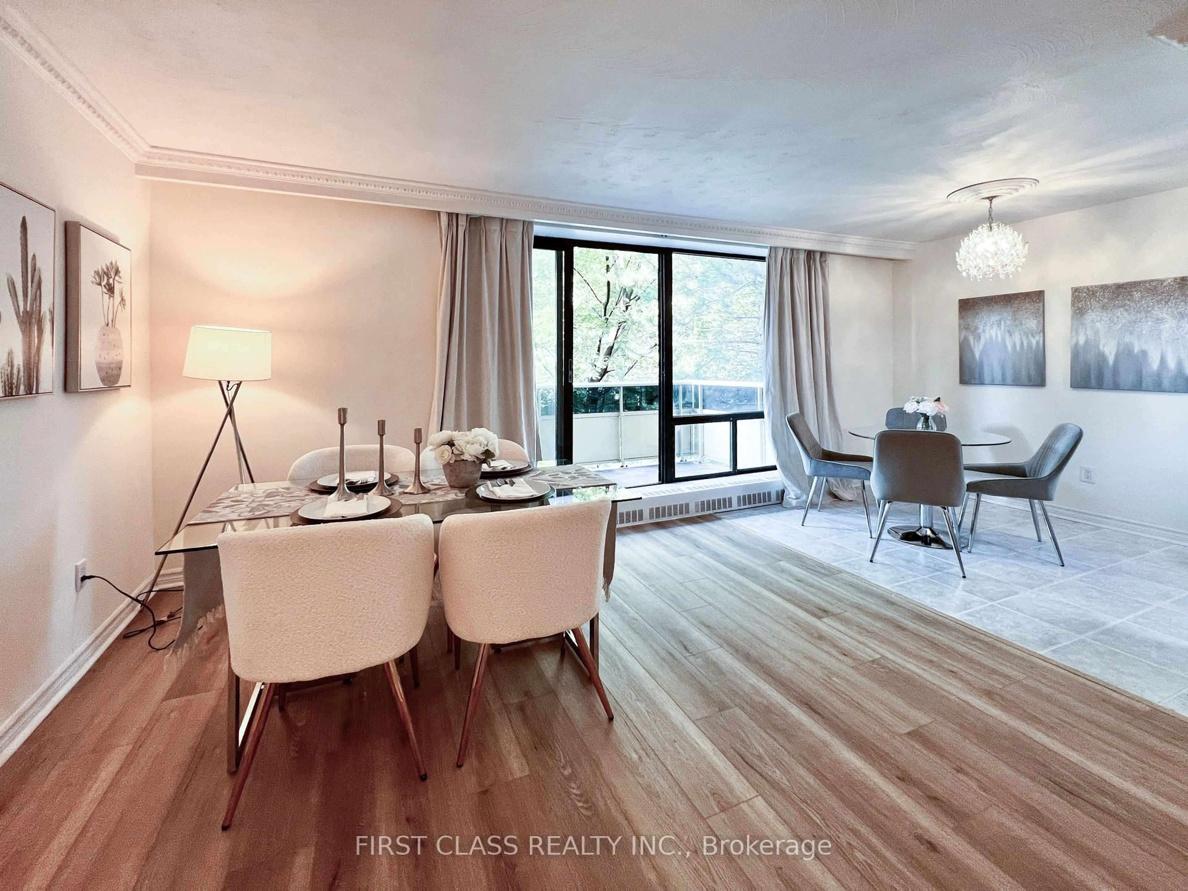 Dining room, wood/laminate floor for 921 Midland Ave #205, Toronto Ontario M1K 4G2
