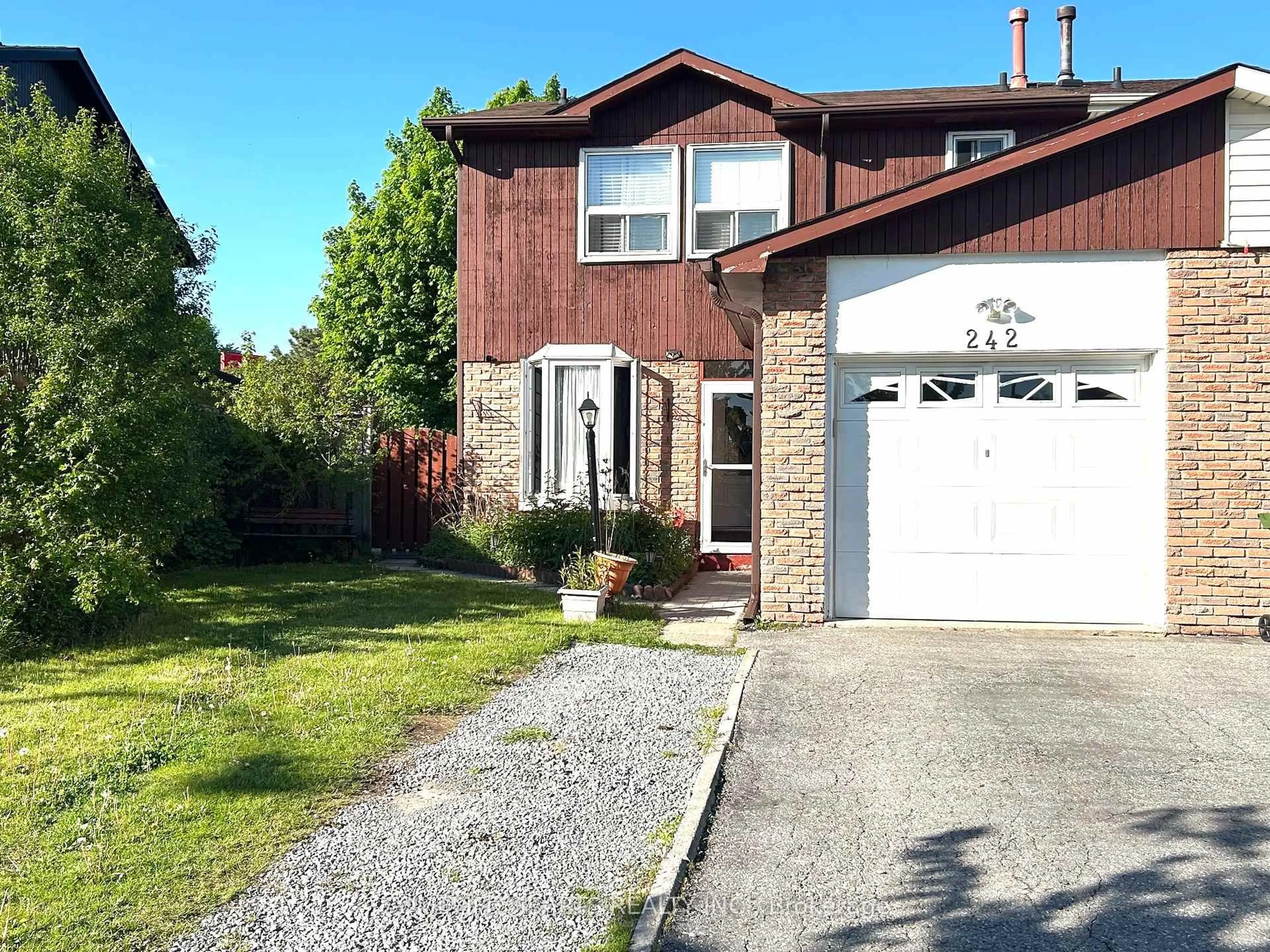Home with brick exterior material, street for 242 Braymore Blvd, Toronto Ontario M1B 2G8