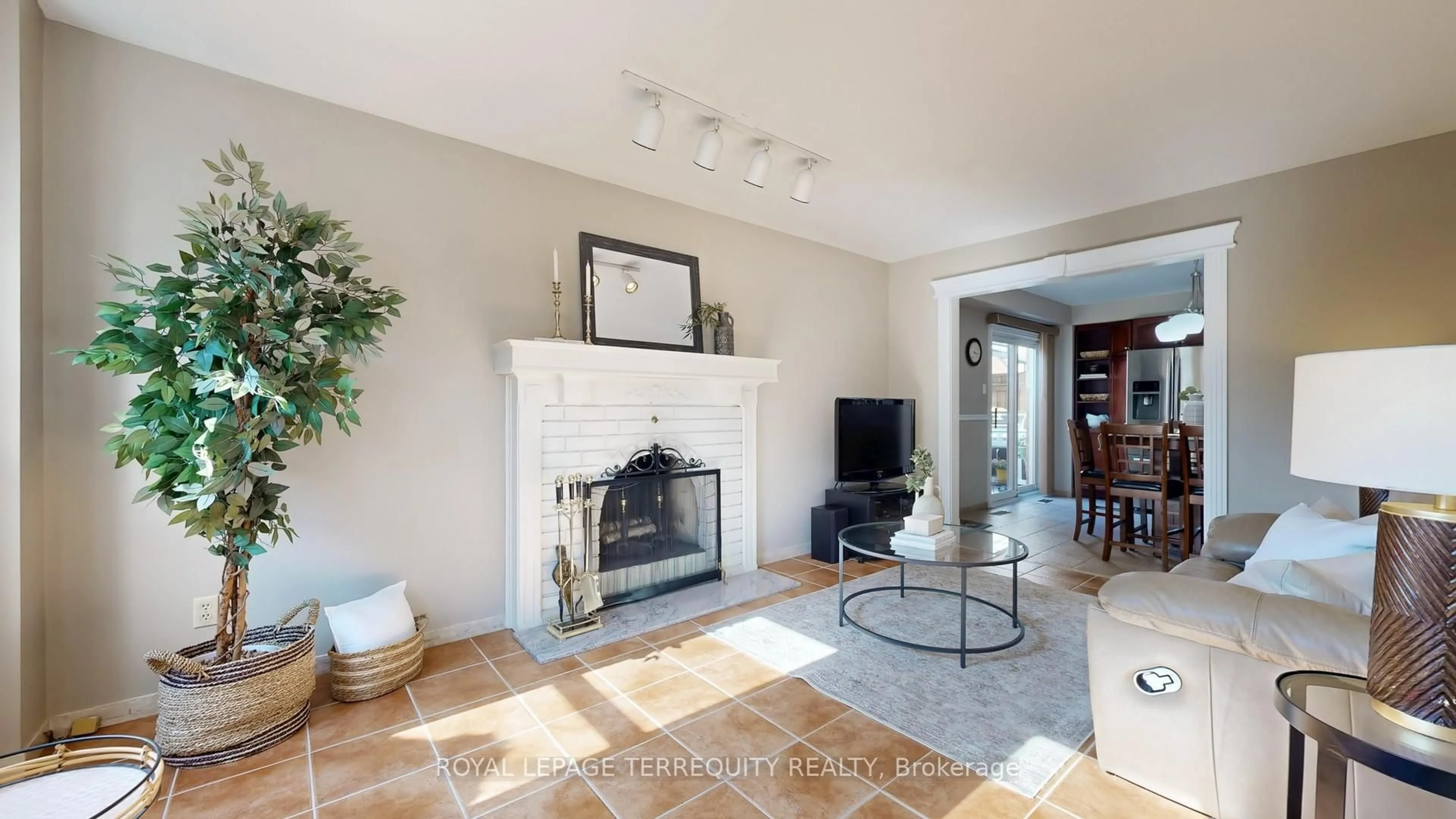 Living room with furniture, ceramic/tile floor for 61 Jason Dr, Whitby Ontario L1R 1L1