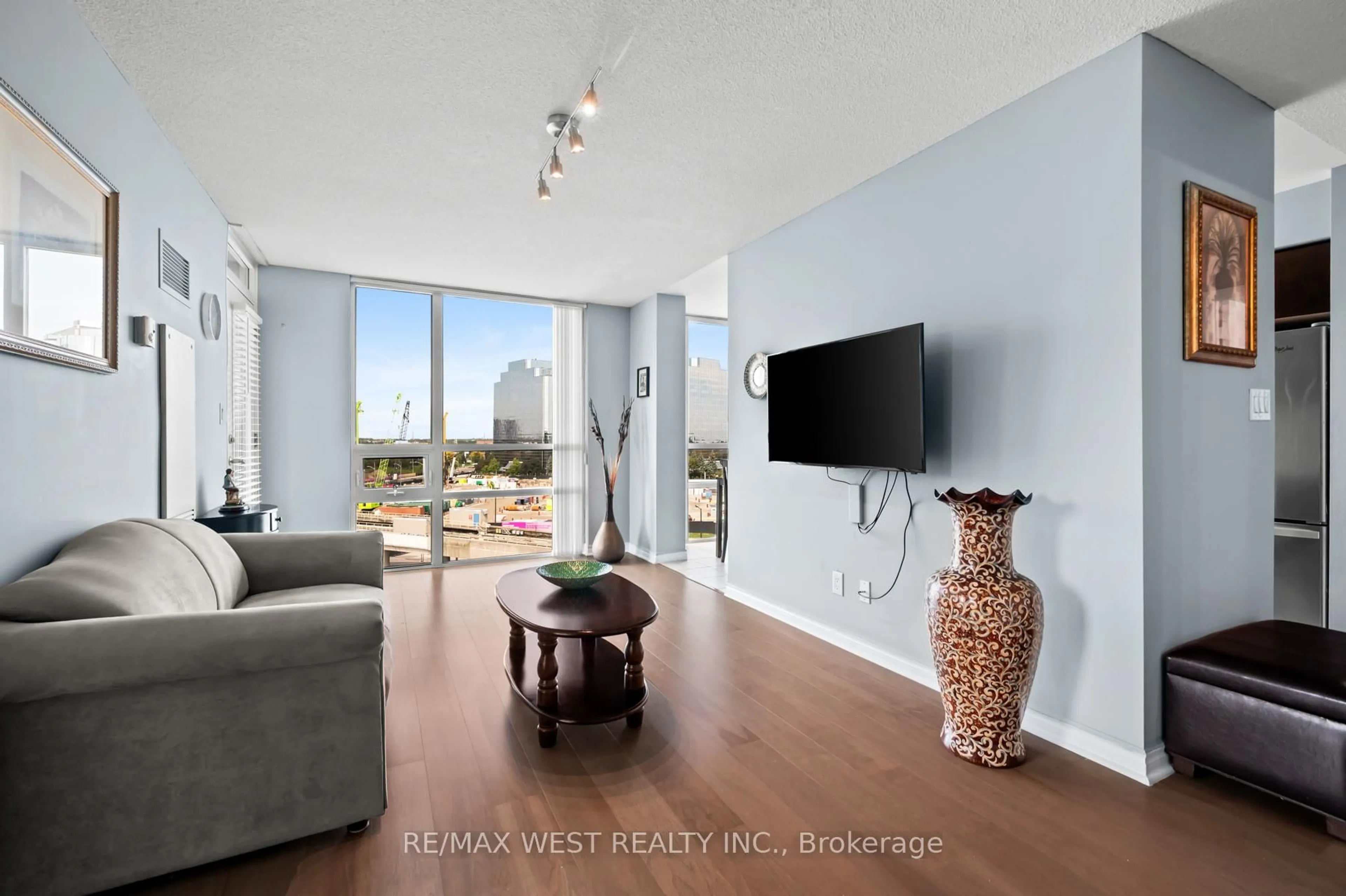 Living room with furniture, unknown for 88 Grangeway Ave #803, Toronto Ontario M1H 0A2