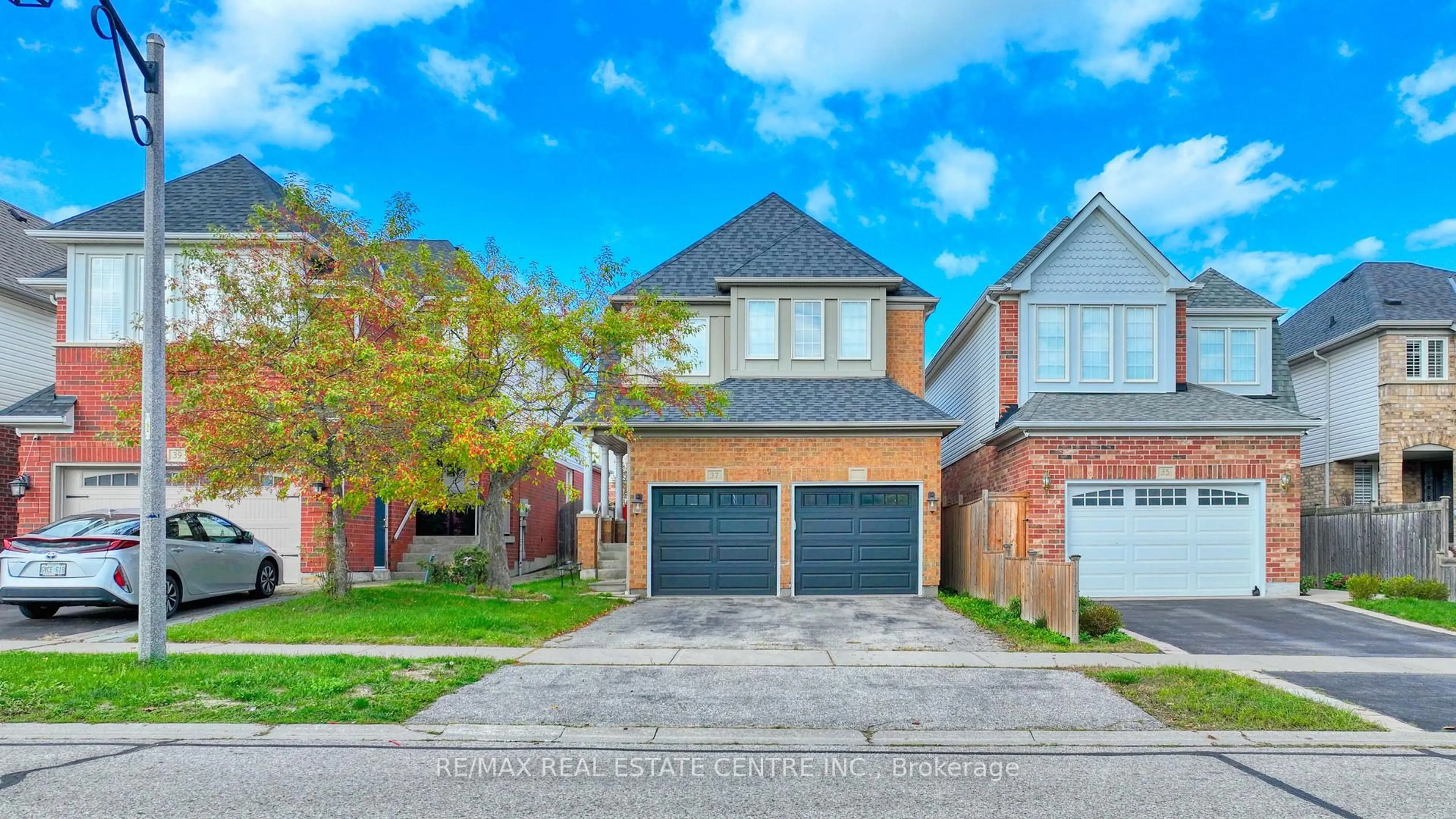Home with brick exterior material, street for 37 Shenandoah Dr, Whitby Ontario L1P 1S9