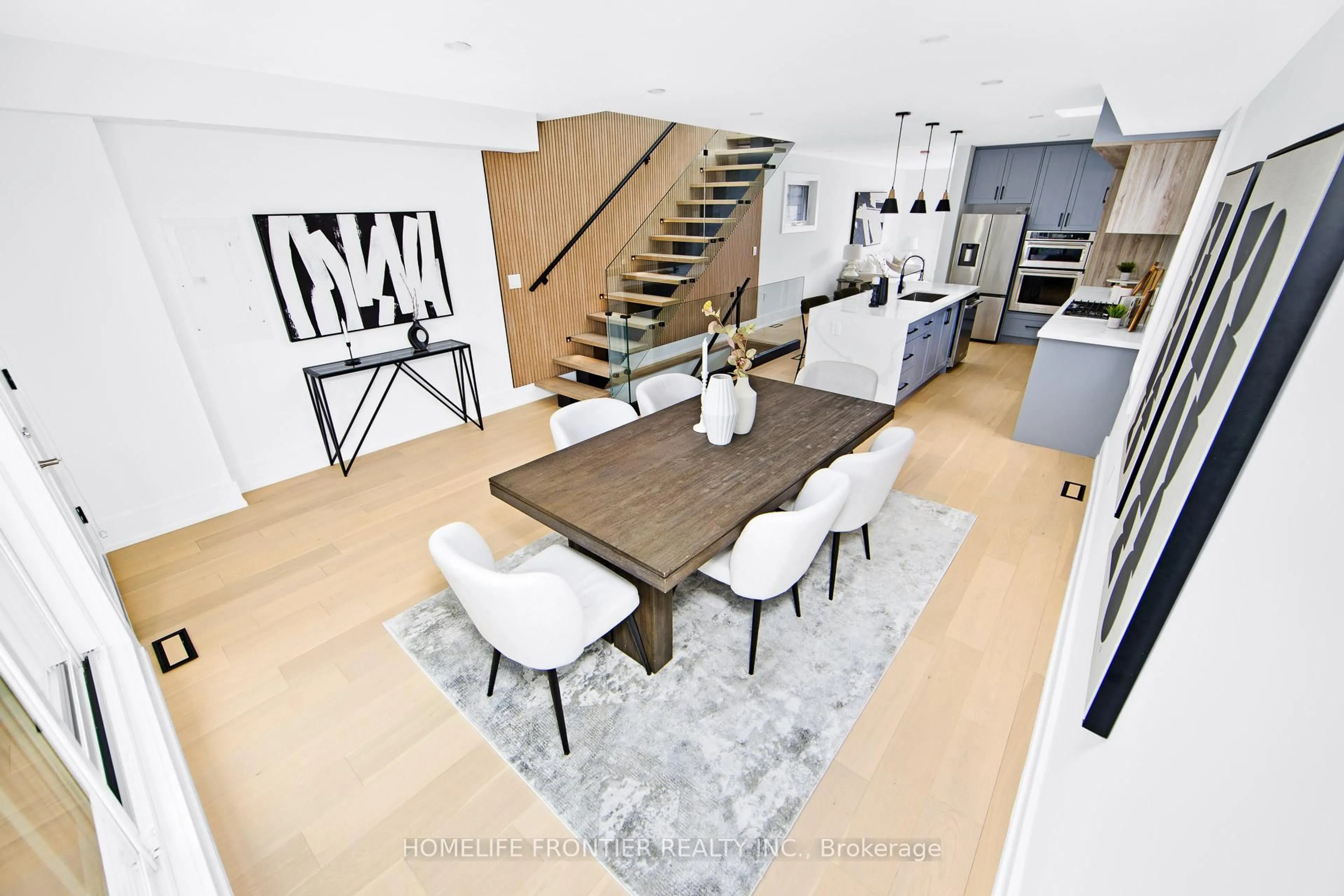 Open concept kitchen, unknown for 3 Wiley Ave, Toronto Ontario M4J 3W3