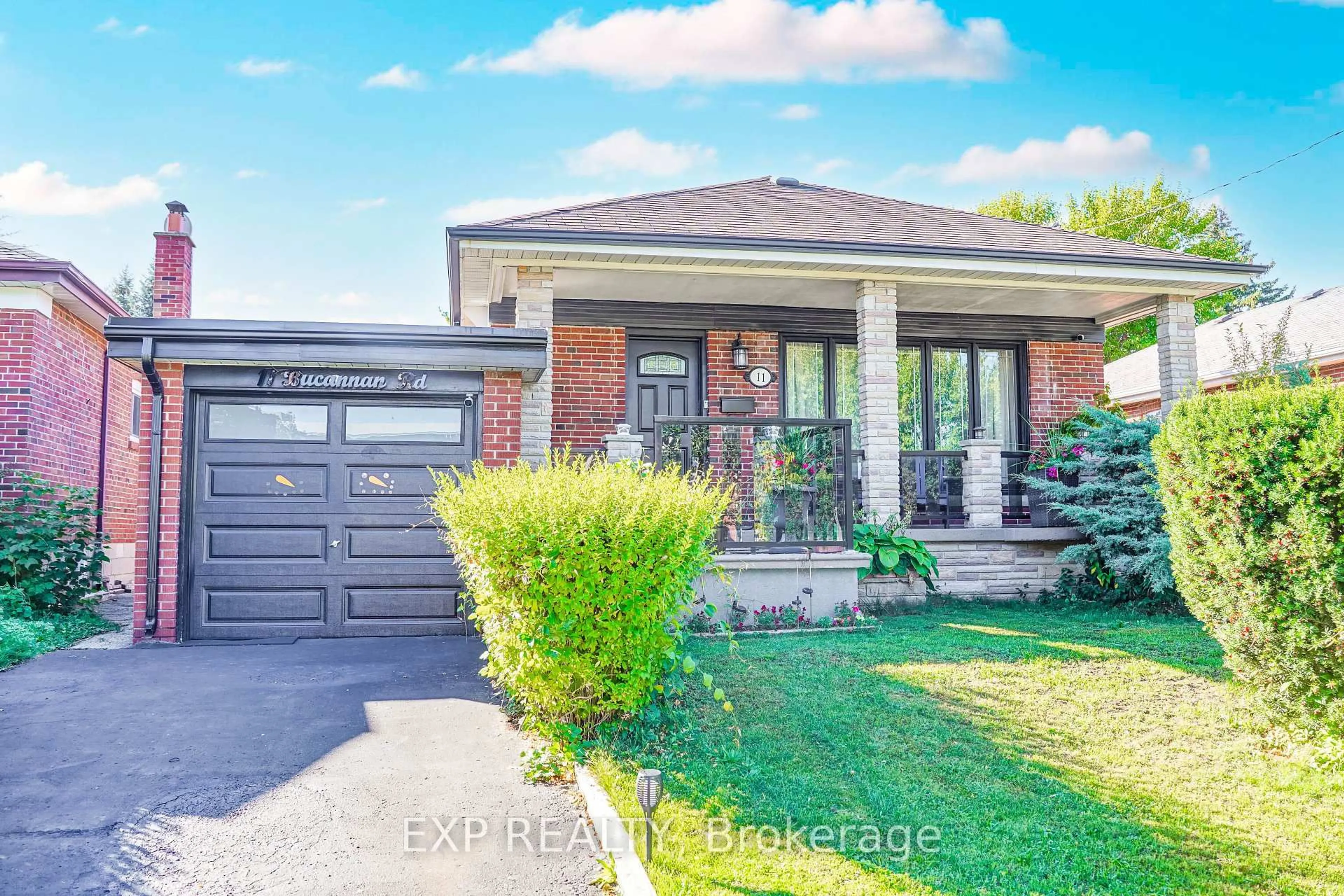Home with brick exterior material, street for 11 Bucannan Rd, Toronto Ontario M1R 3V2